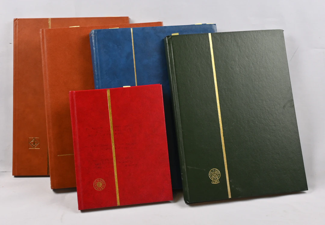 Stock selection in five stockbooks eg. Red Cross, numeral postmarks
