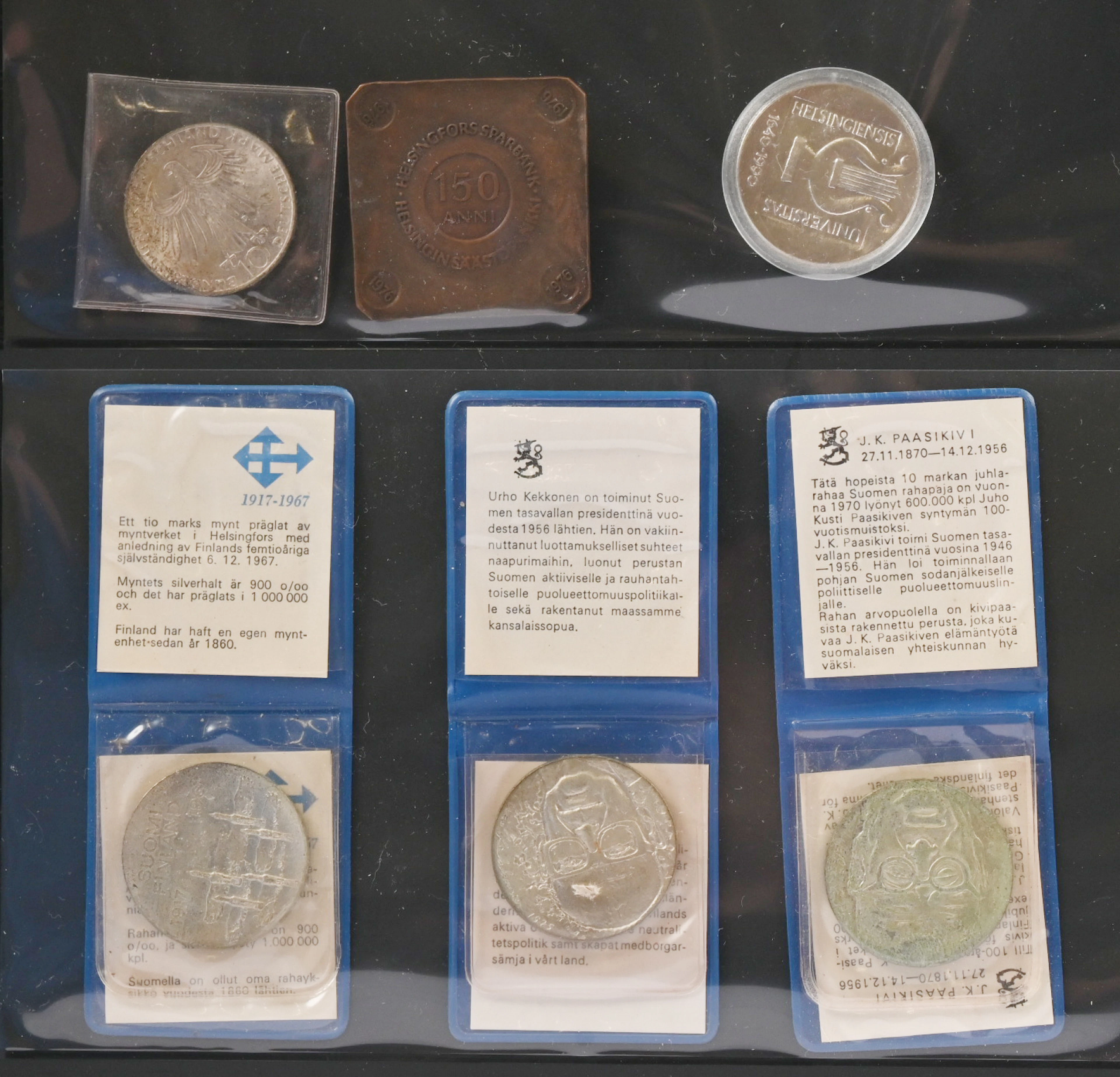 Silver commemorative coins one of 100 markka and three of 10 markka.