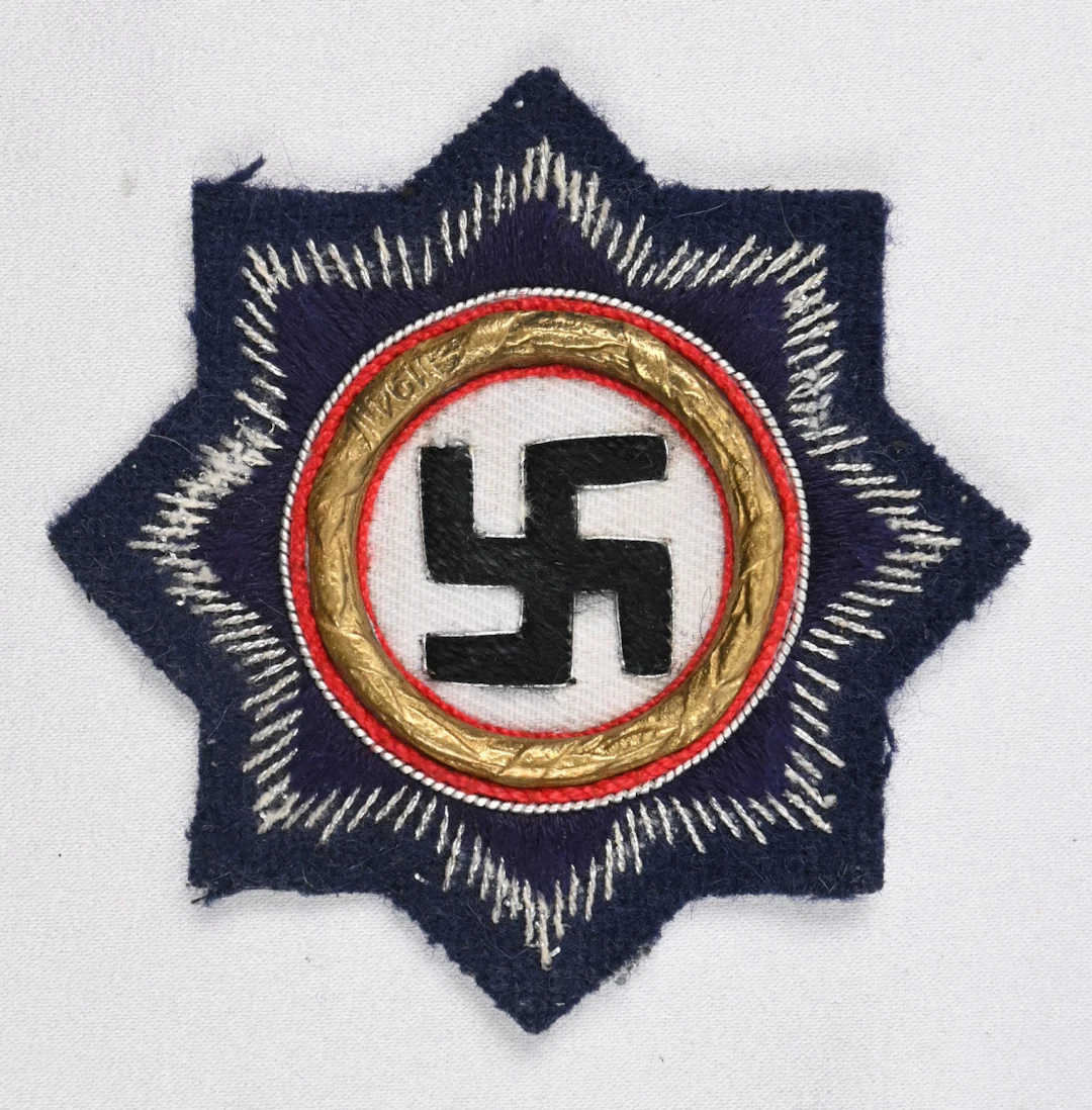German ”German Cross in Gold”, embroidered version on navy cloth.