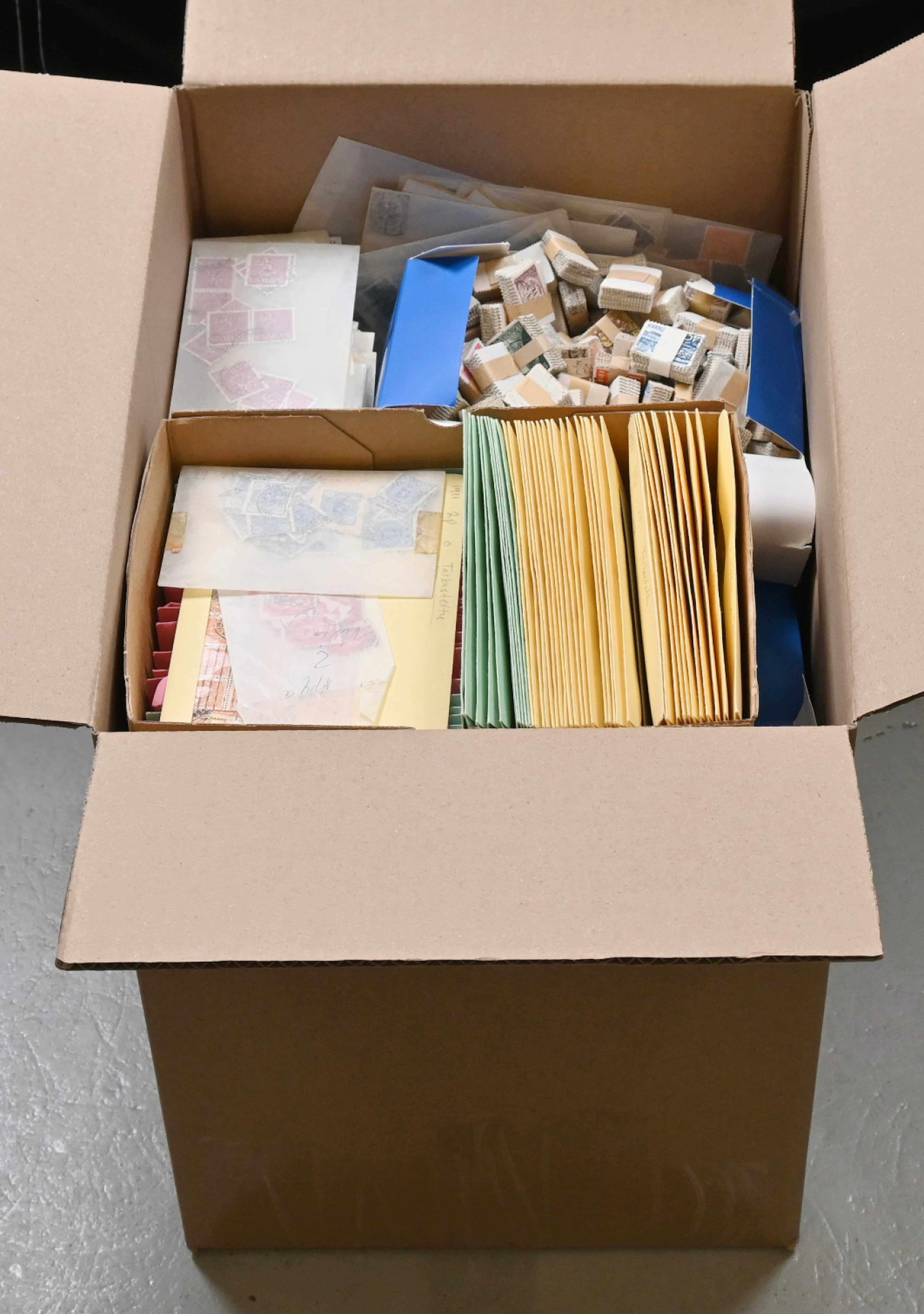 Finland and foreign countries loose bulk stamps in bags and on stockcards