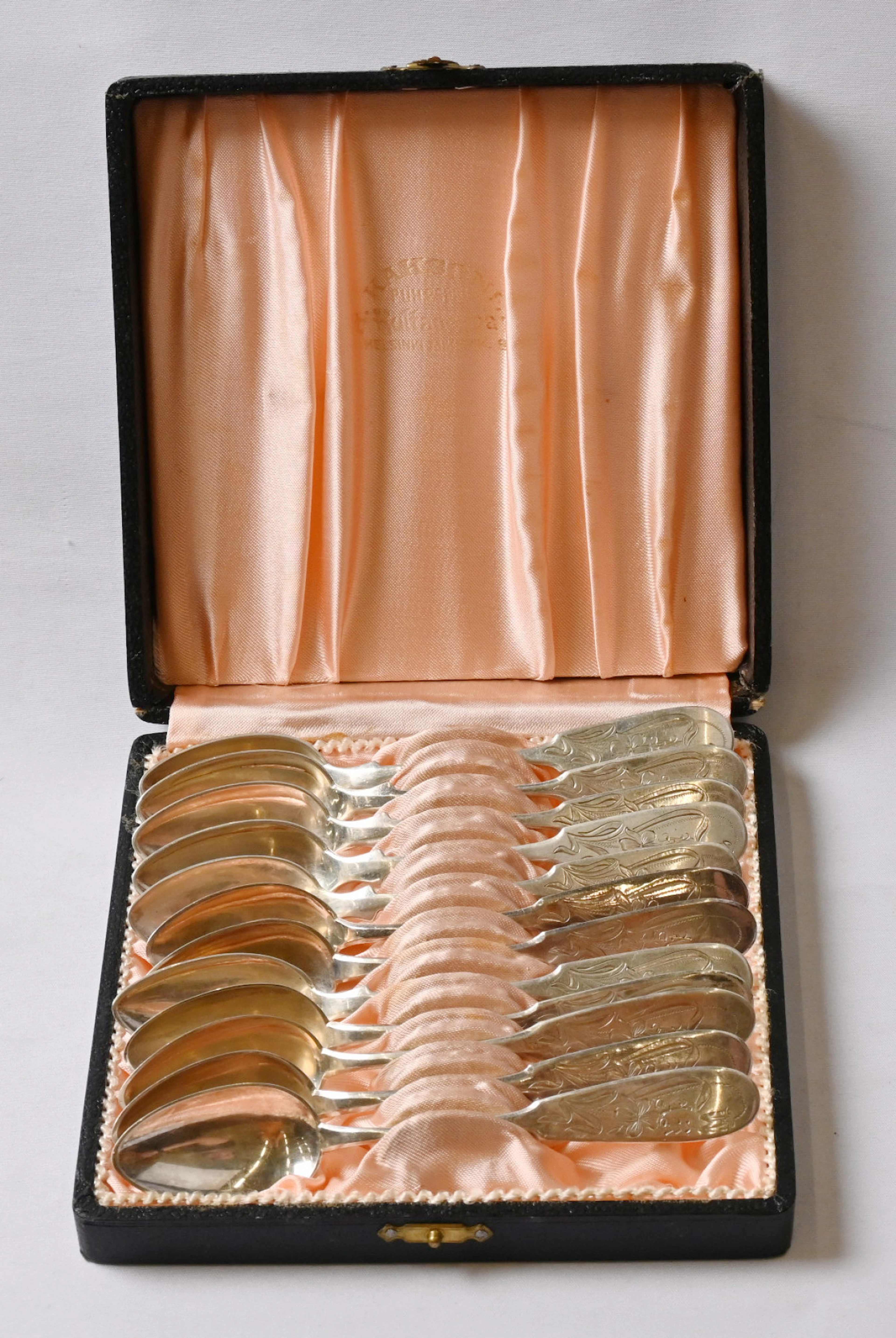 Coffee spoons with monogram engraving, 813 silver, 12 pieces (á 15 g) in a box.