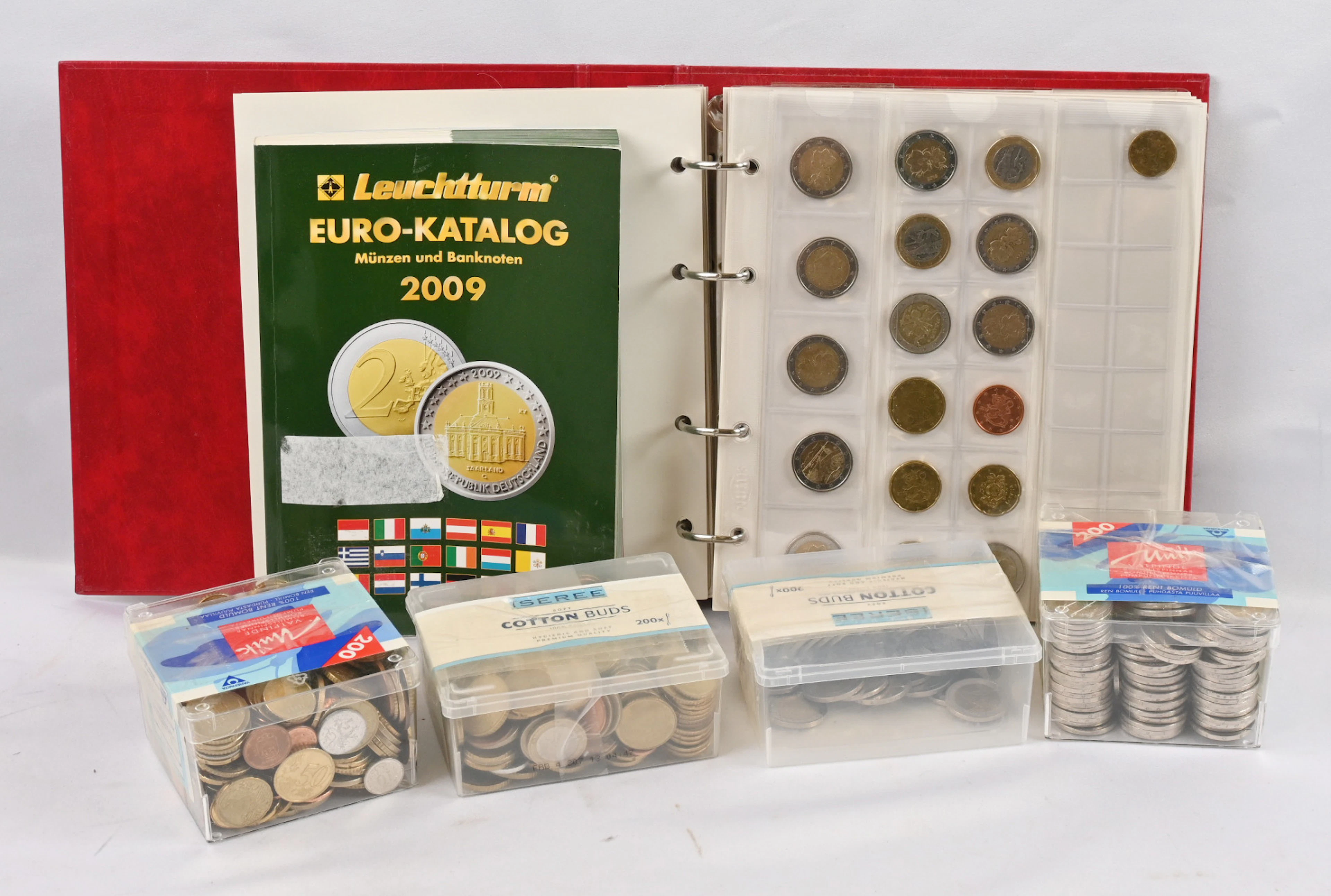 Euro coins large selection in an 8 KG box. In a small album and boxes
