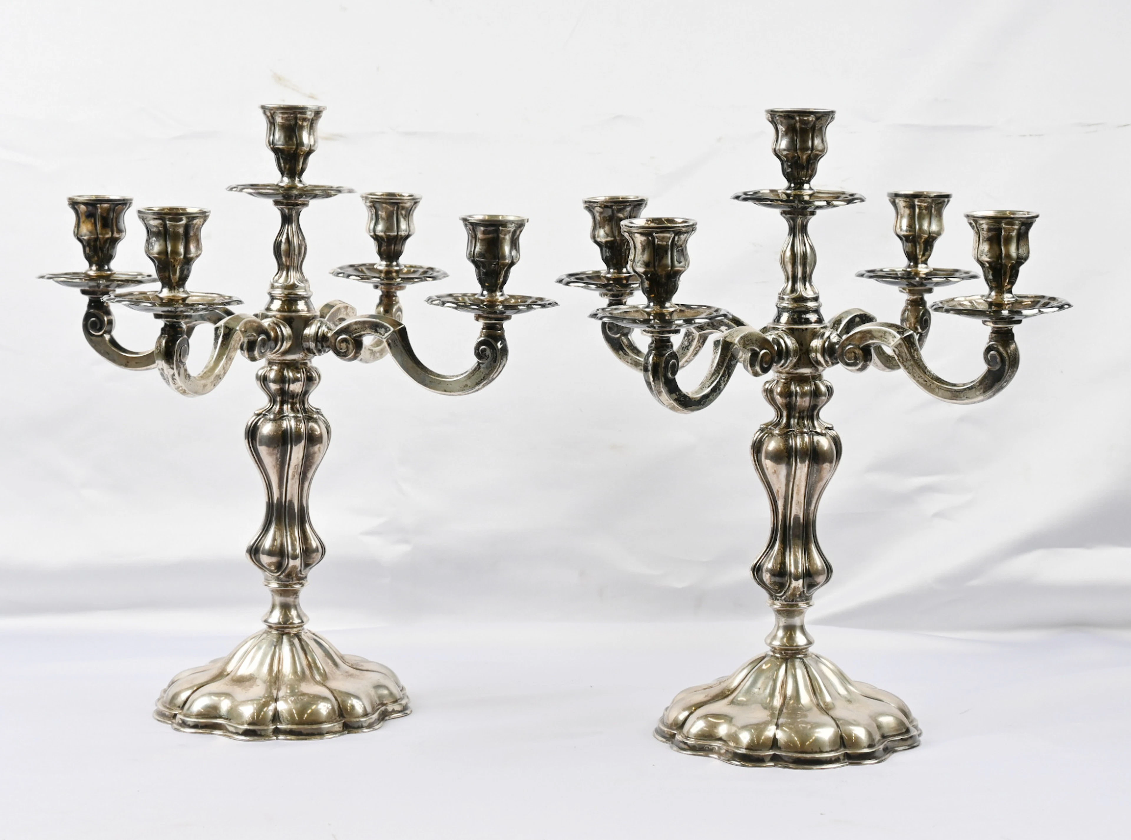 Five-branched candlestick, height ca. 38 cm, diameter 36 cm. Two striking