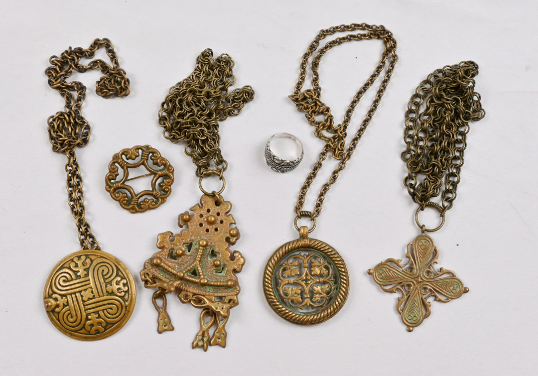 Kalevala jewelry four pendants with chains and a brooch bronze as
