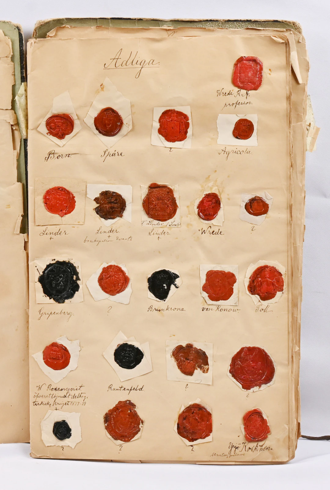 Incredibly fine old seal collection on pages in a broken album where