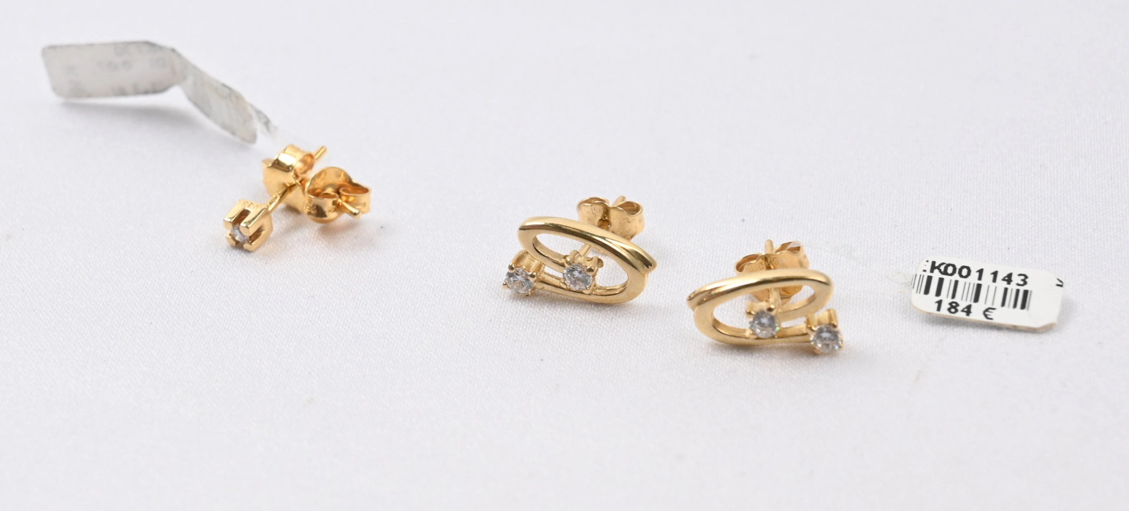 Diamond earrings gold (750) gross weight approximately 1.3 g and zircon