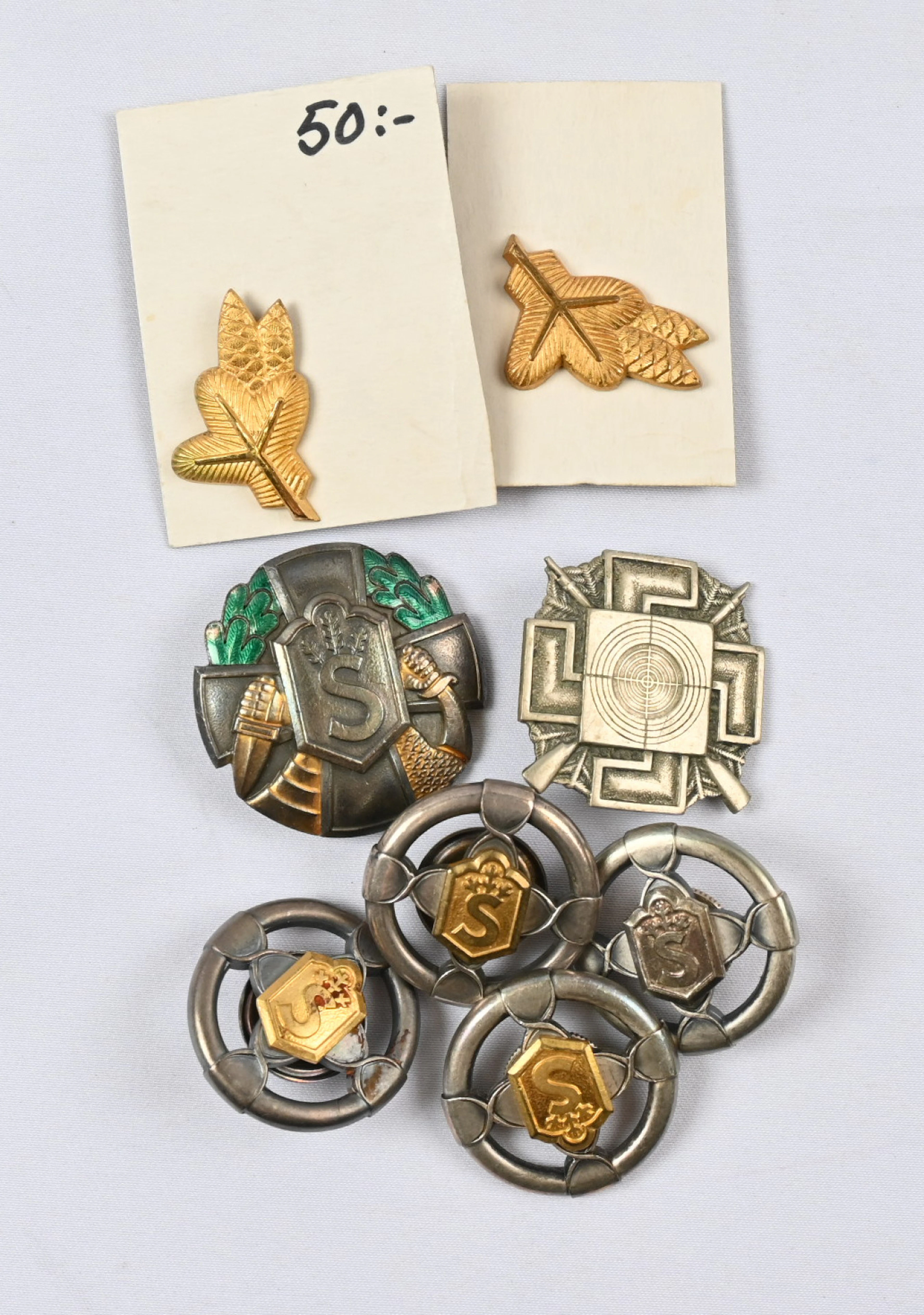Selection of badges, eg. rifle shooting badge model 1921 (with a relatively