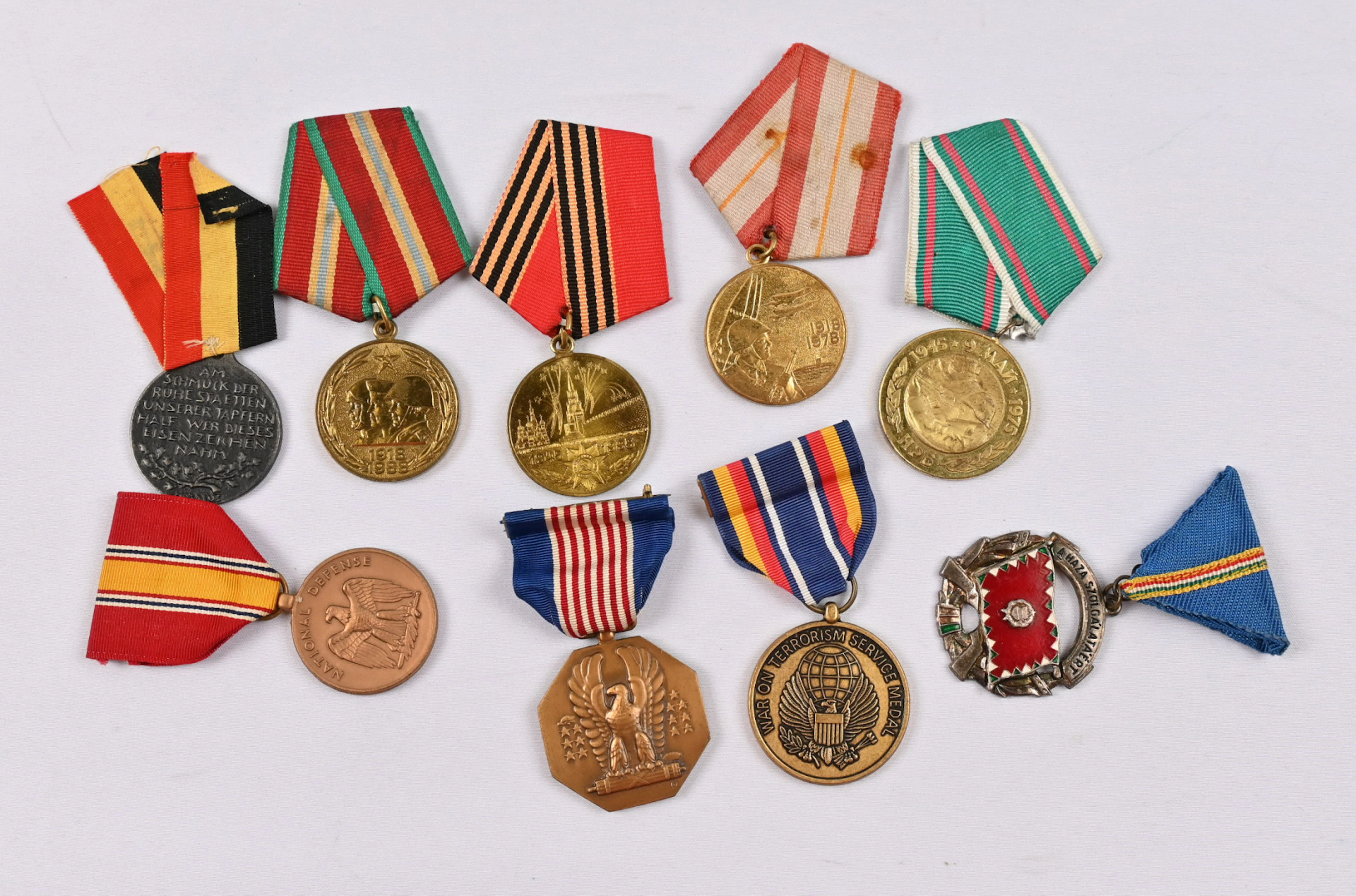 Selection of foreign merit badges and medals eg. USA and Soviet Union.