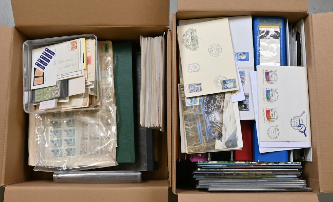 Mixed postal items, first day covers etc. in nine binders and additionally