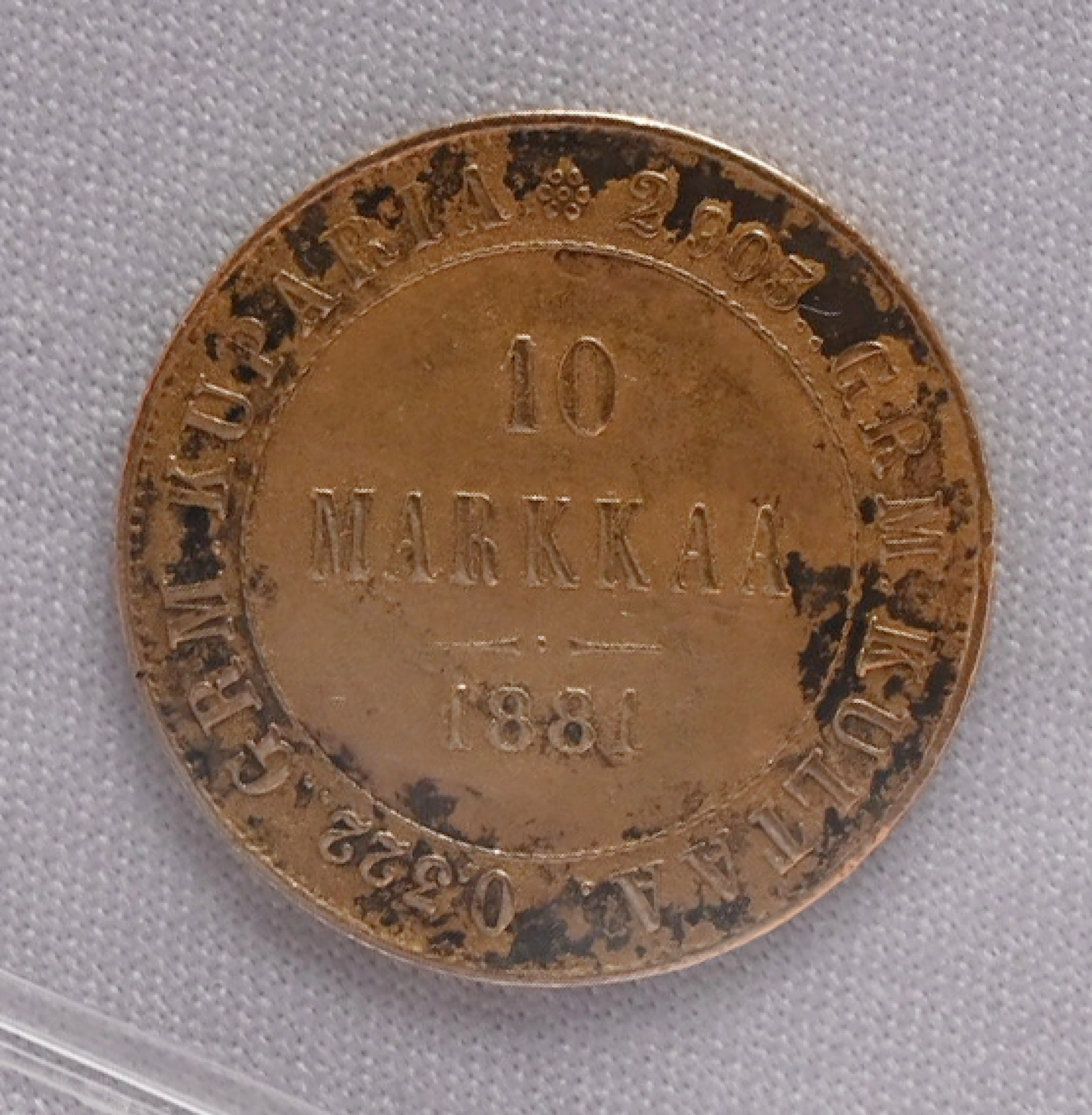1881 10 markka gold. Patina of age.