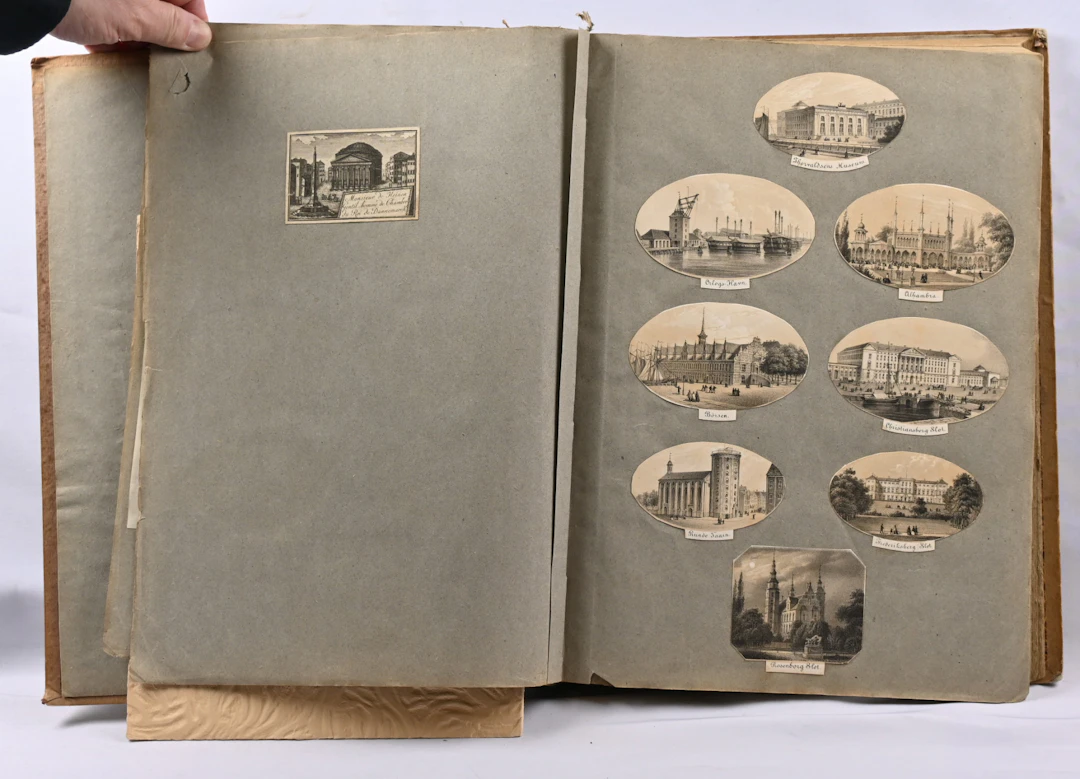 Old album of seating arrangement cards etc. material approximately 2½ KG.