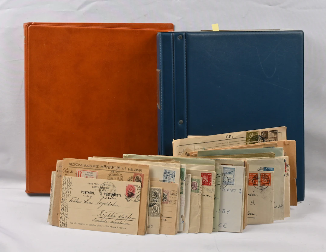 In two binders and as loose items in a box postal items from Finland