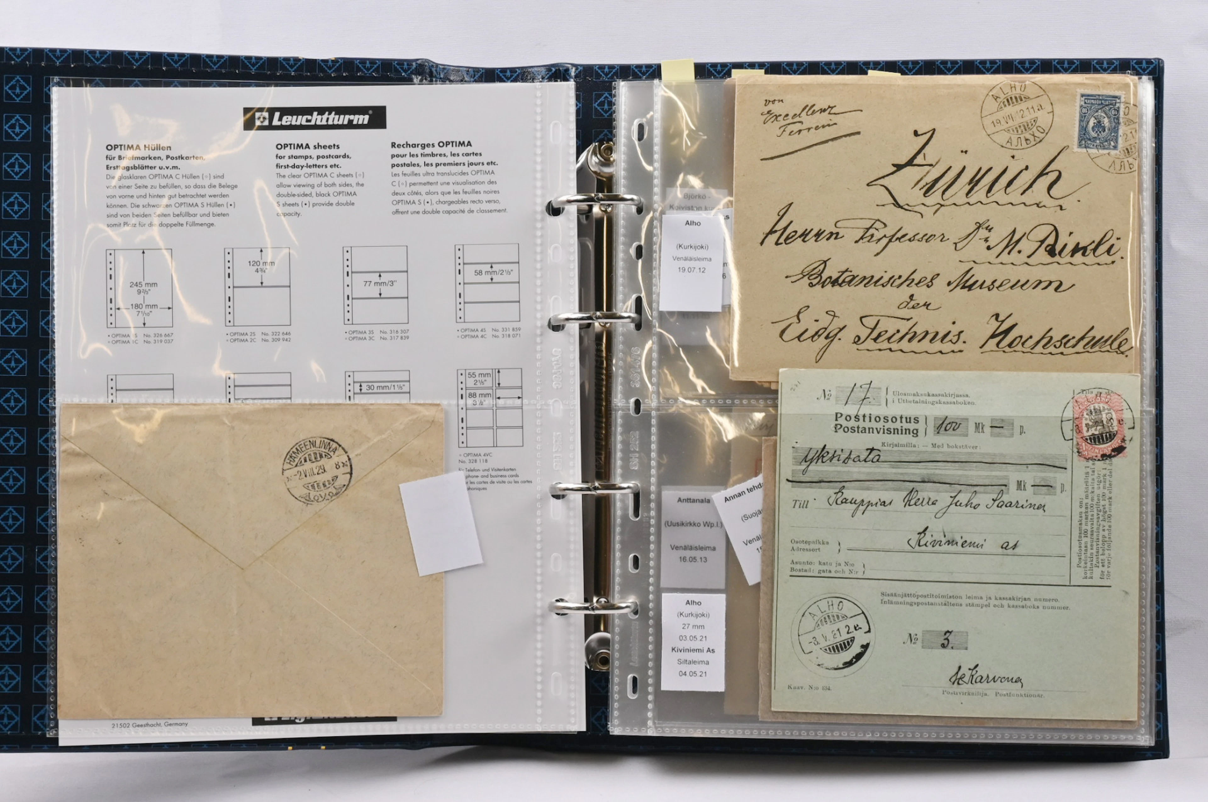 Collection material postmarks: A - J on pages in an album over 40