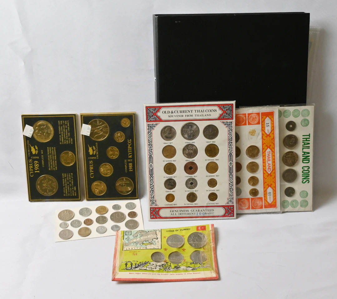 Worldwide interesting selection in a box, old and new coins as well