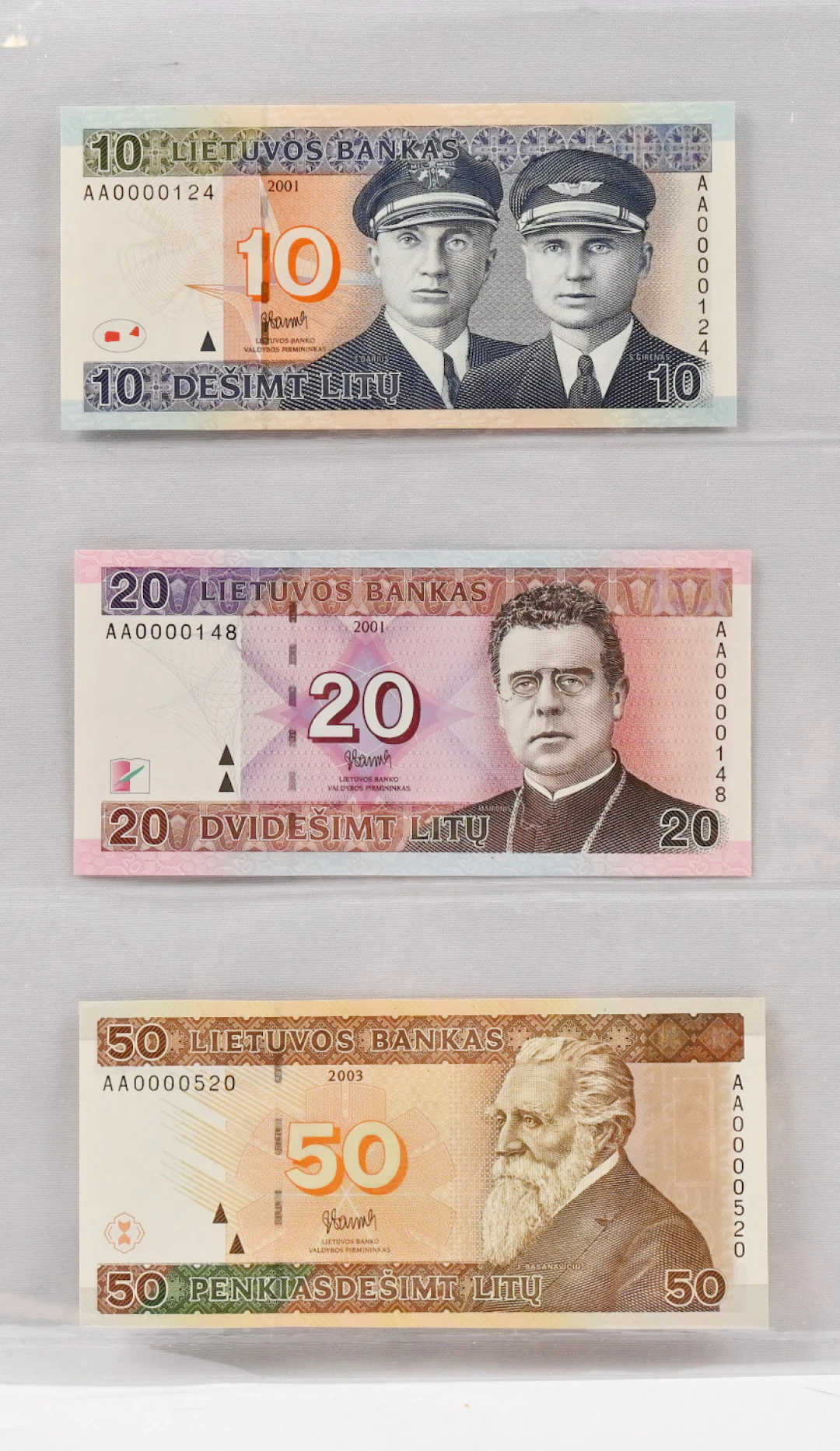 Lithuania, three banknotes with rare small serial numbers: 2001 10