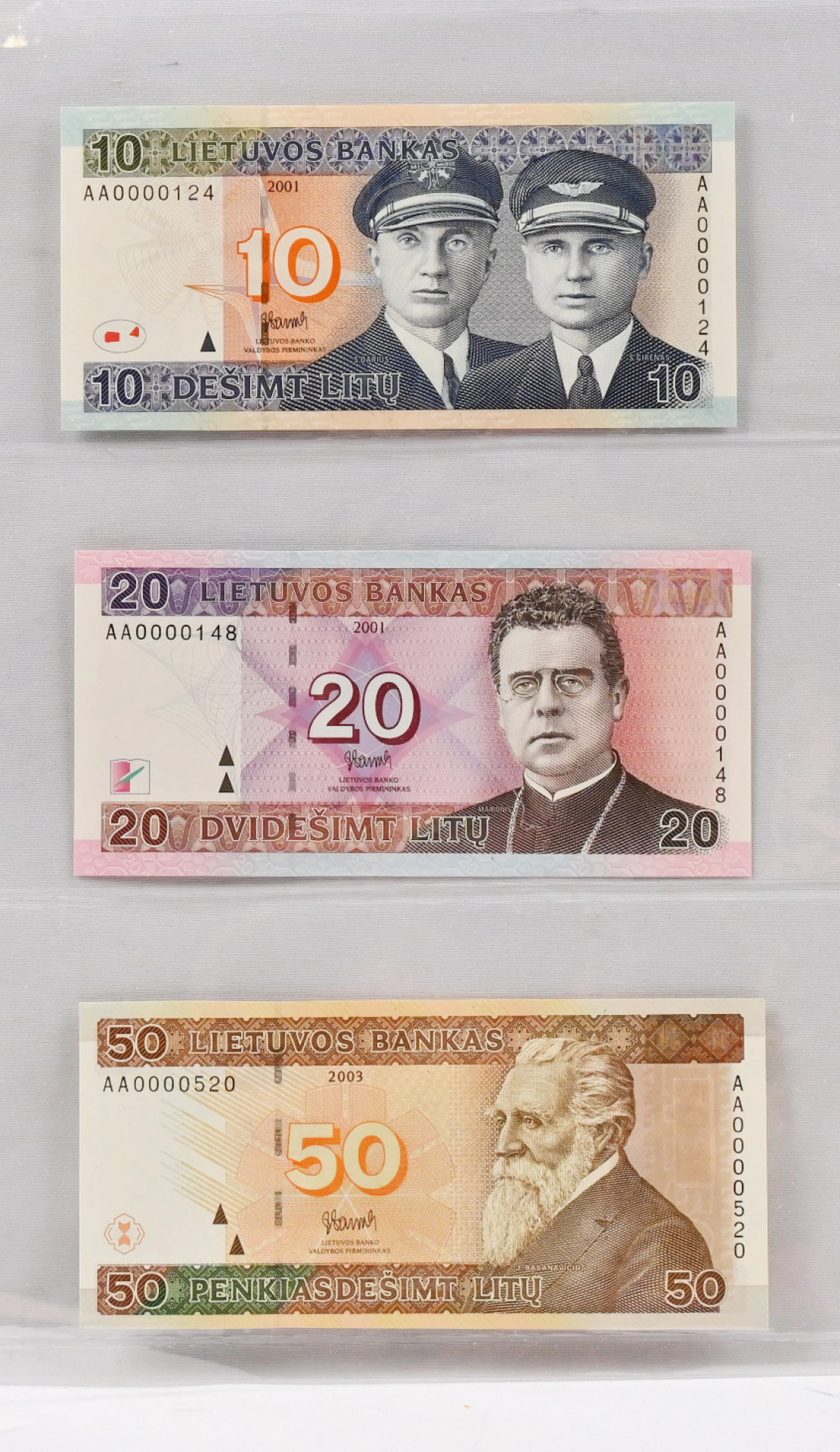 Lithuania, three banknotes with rare small serial numbers: 2001 10