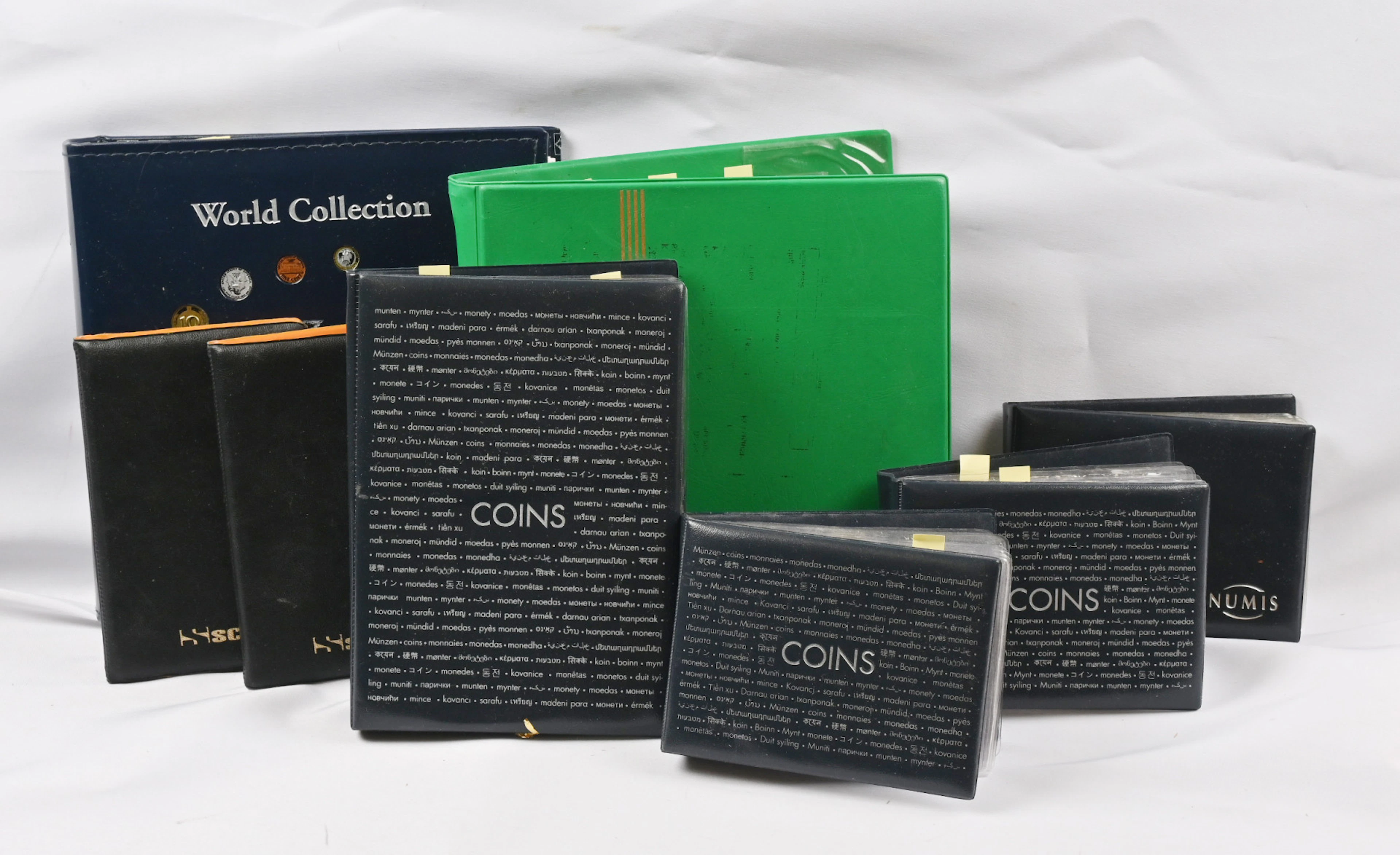 Whole world coin lot in eigh albums in various sizes, ca. 9 KG