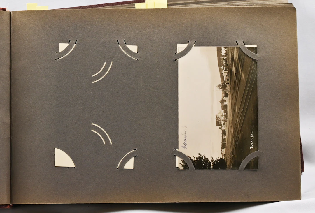 Old album with Finnish and foreign cards and some photos without backside