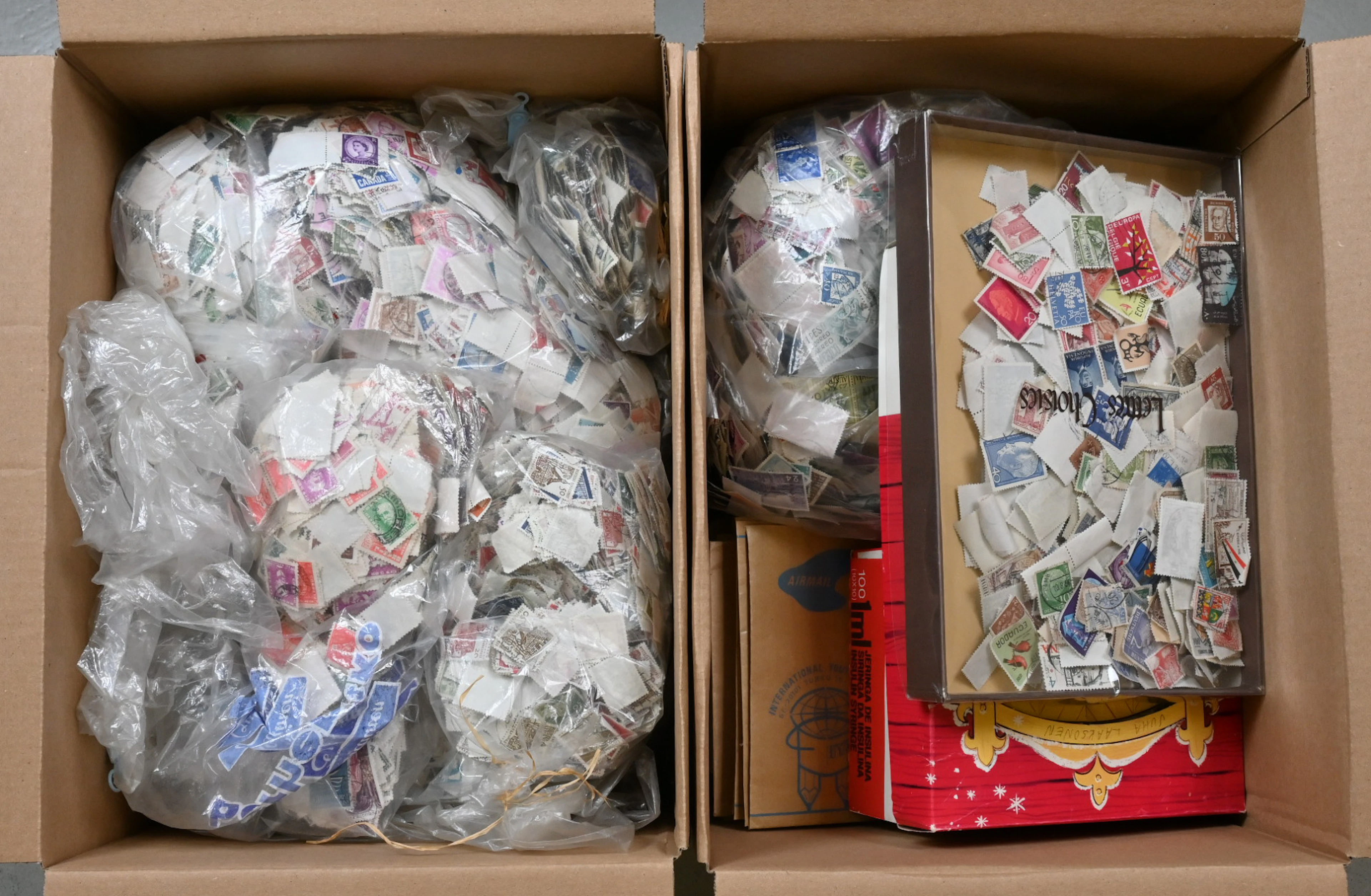Ordinary stamps from various countries in two boxes, gross weight