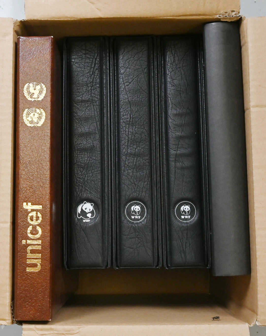 Animals, three WWF albums. Additionally an album of UN flag stamps
