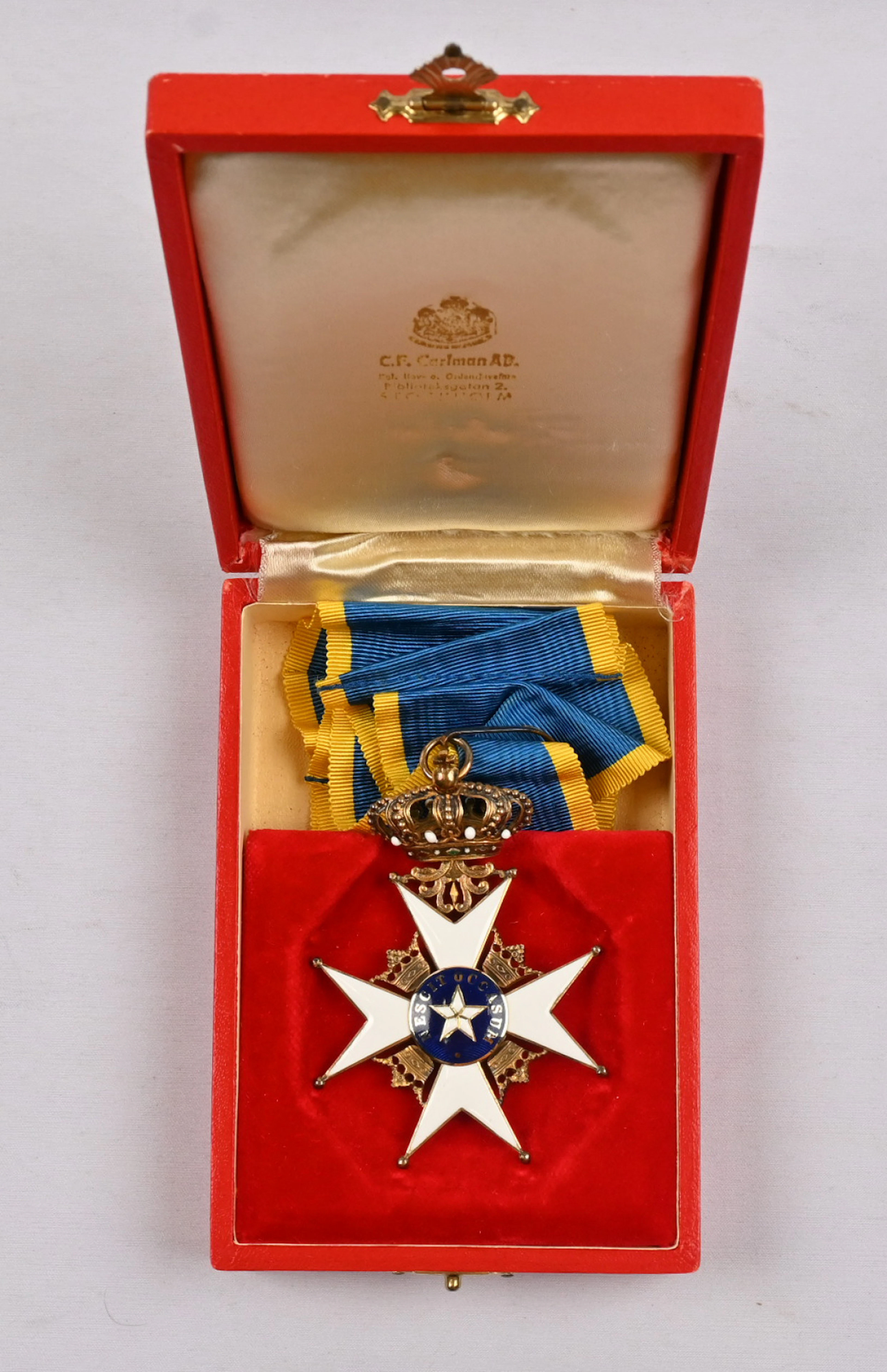 Commander's cross of the Swedish Order of the Polar Star in its box.