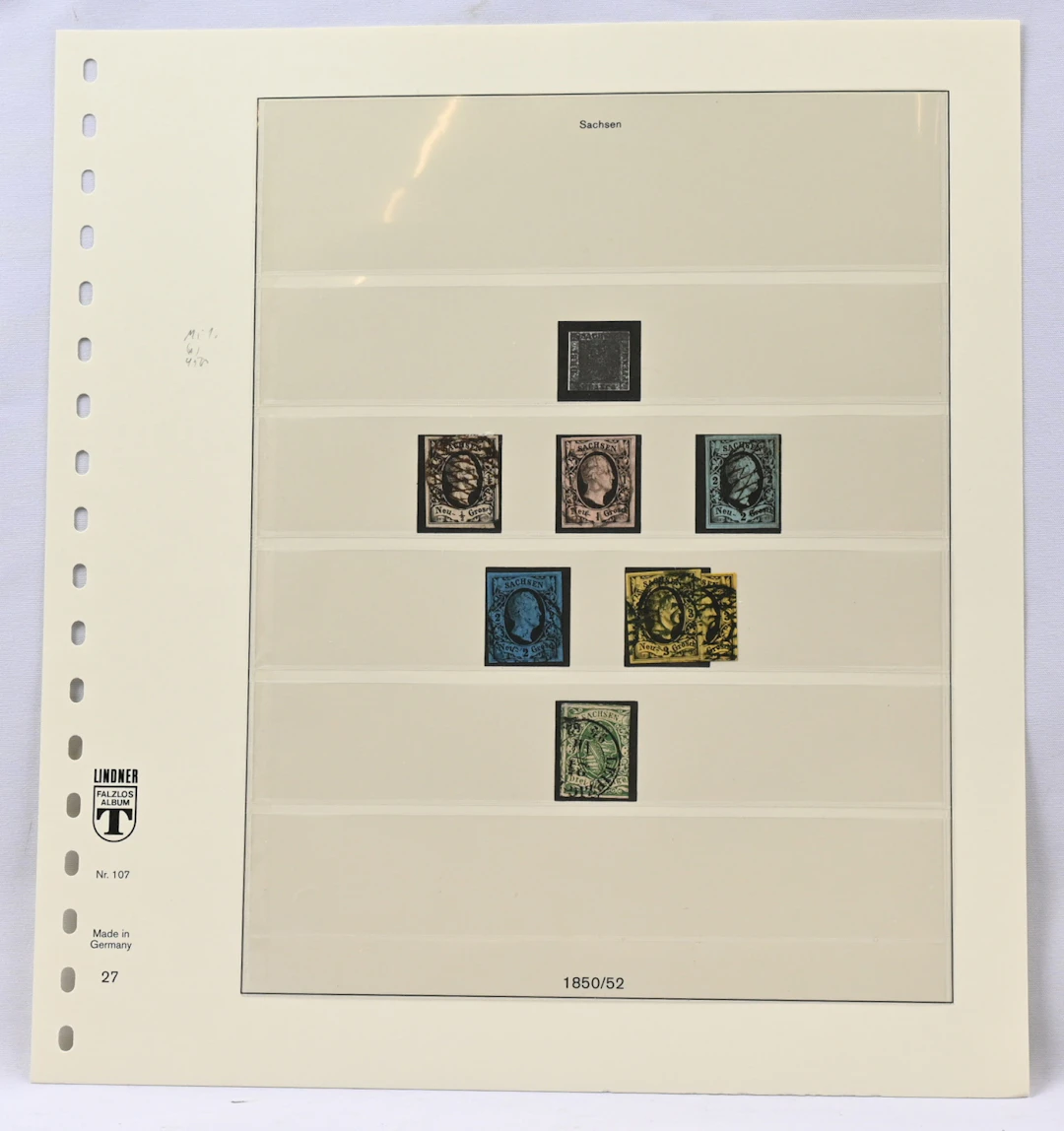 Saxony and Schleswig-Holstein collections on pages, approximately
