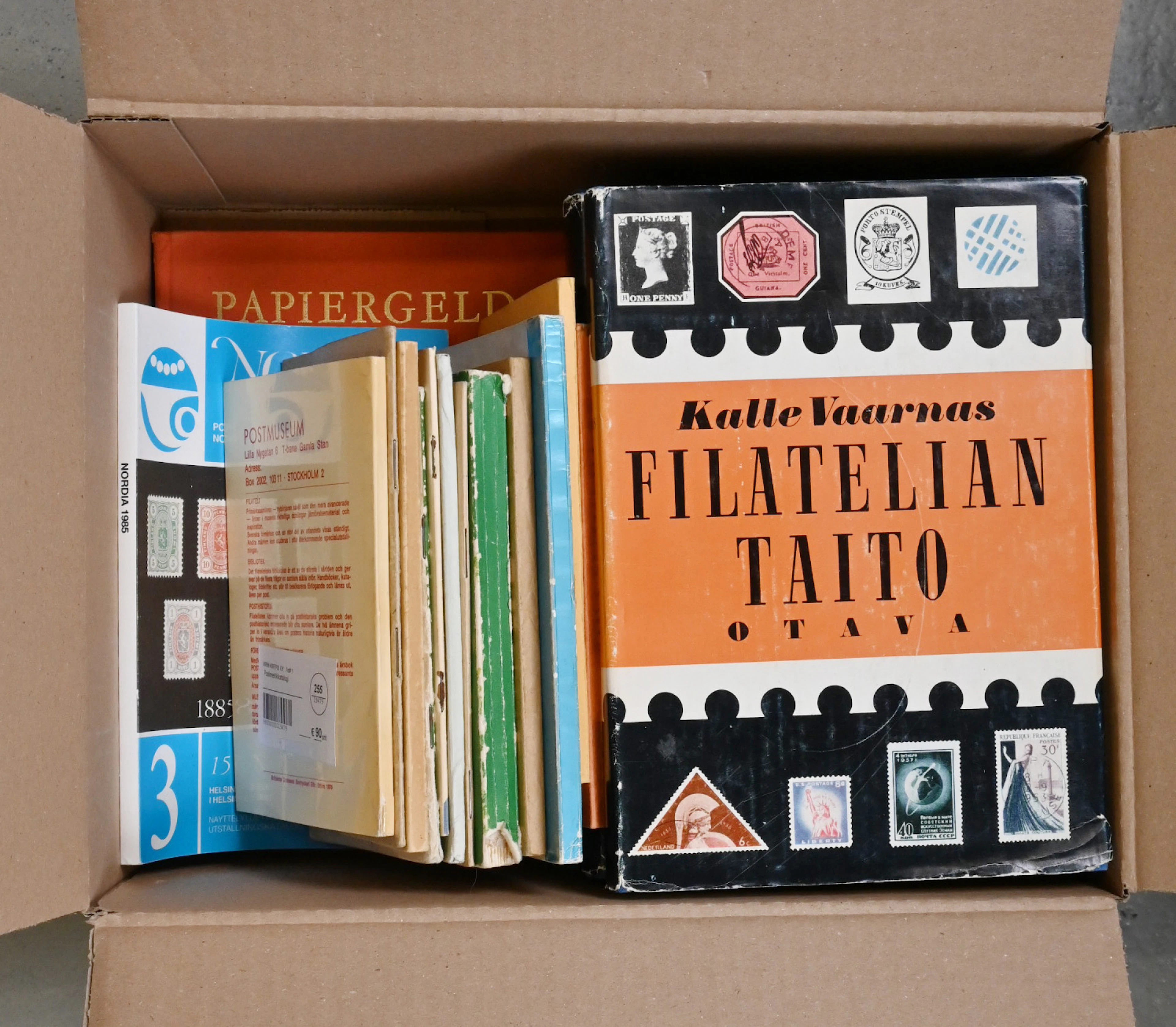 Small box of literature, eg. handbooks, "Filatelian sanasto", "Filatelian