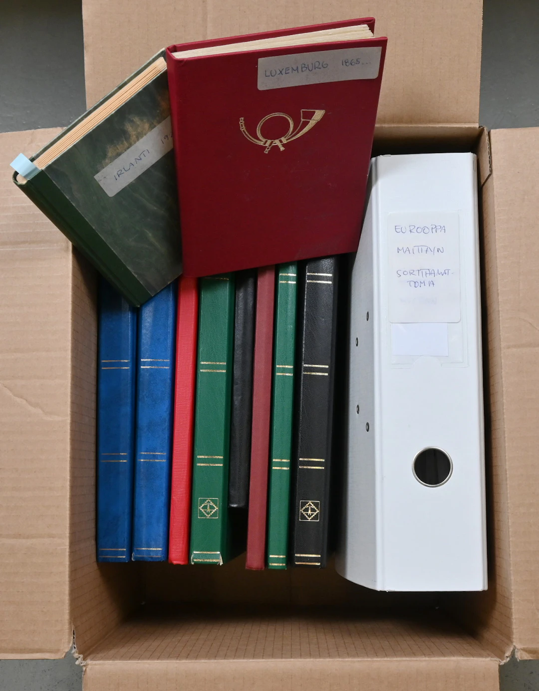 Stamps from various European countries in a thick binder and in ten