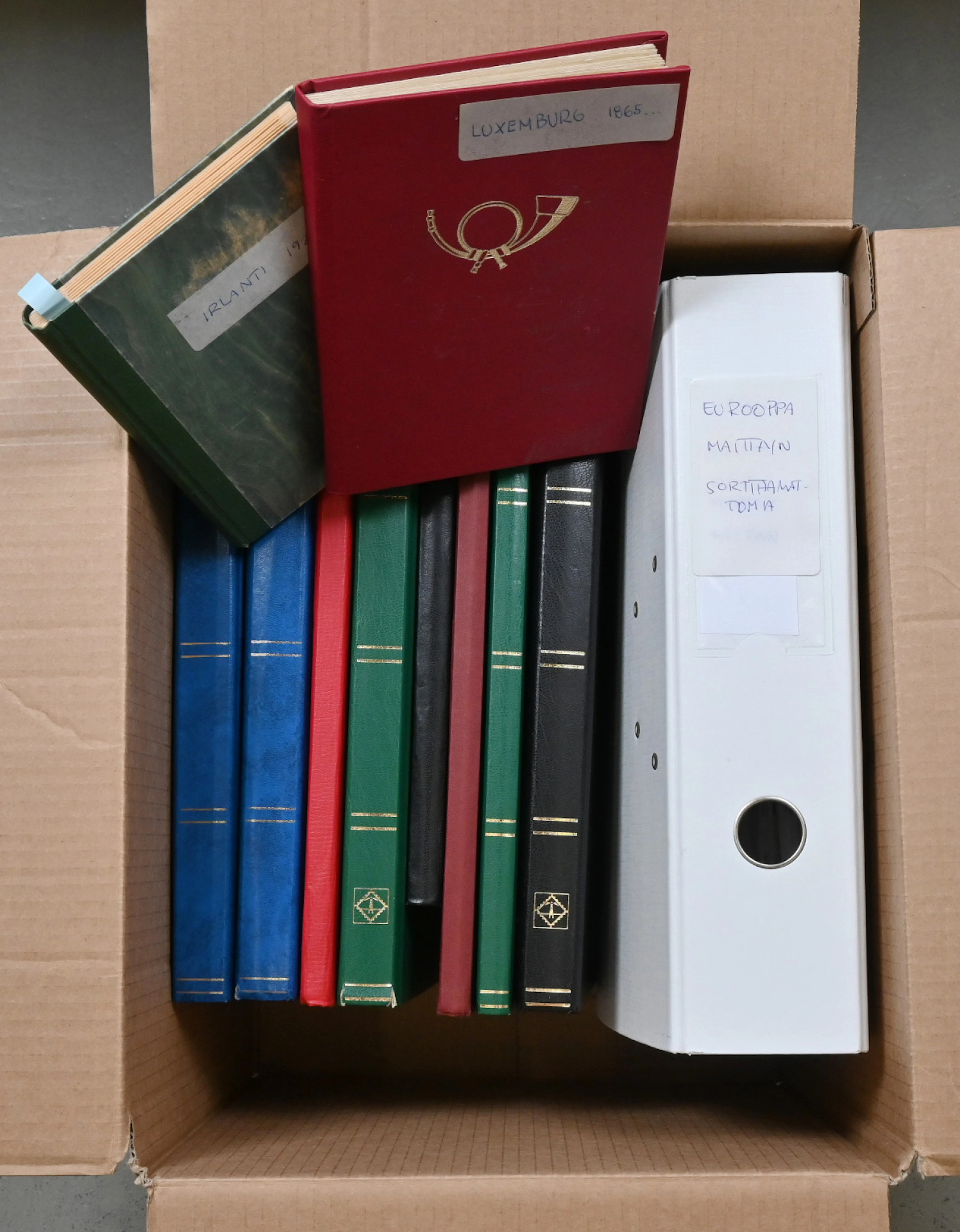 Stamps from various European countries in a thick binder and in ten