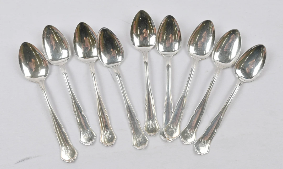 Chippendale coffee spoon, silver (830), nine pieces with engravings.