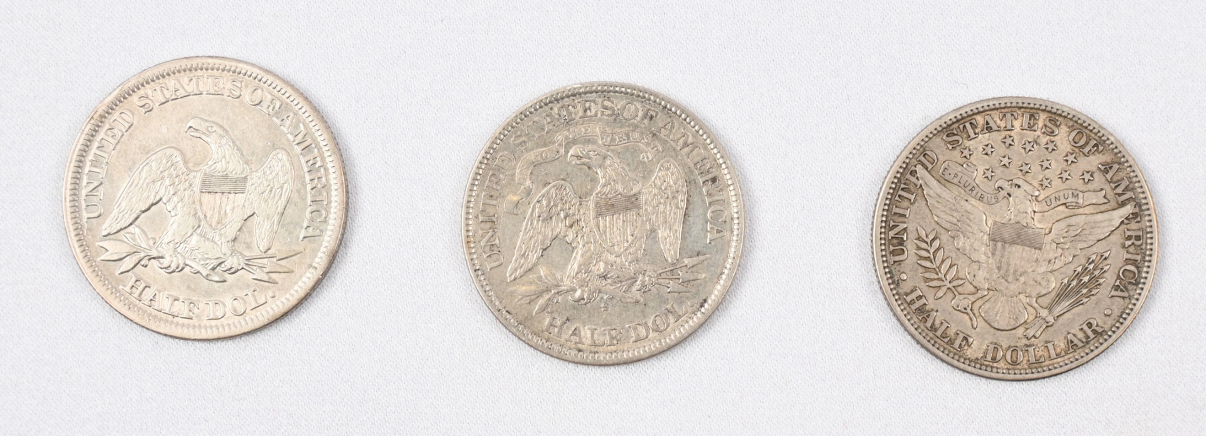 USA 1854, 1871 and 1911 ½ dollar silver coins. Fine condition.