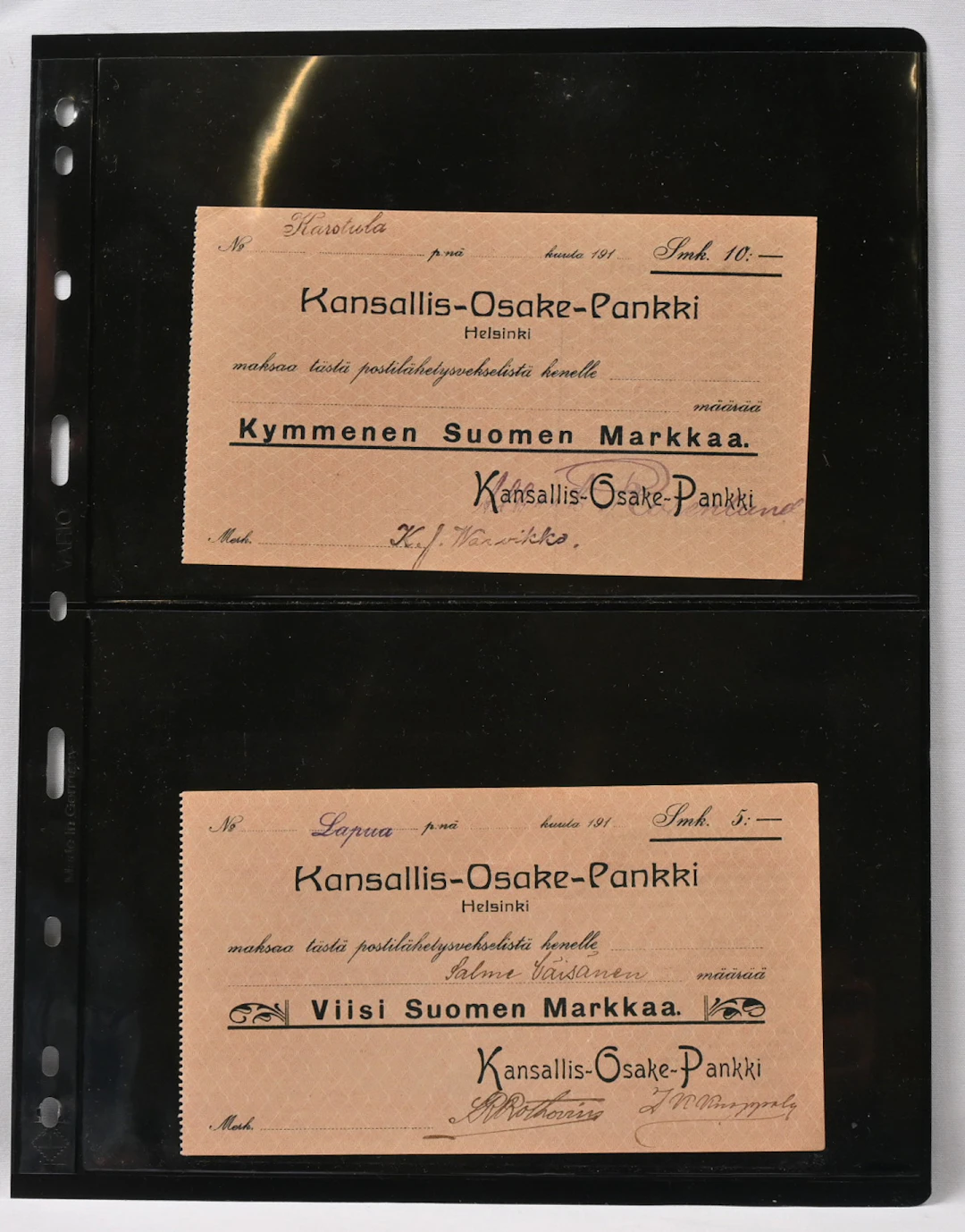 Kansallis-Osake-Pankki five and ten markka checks from the era of