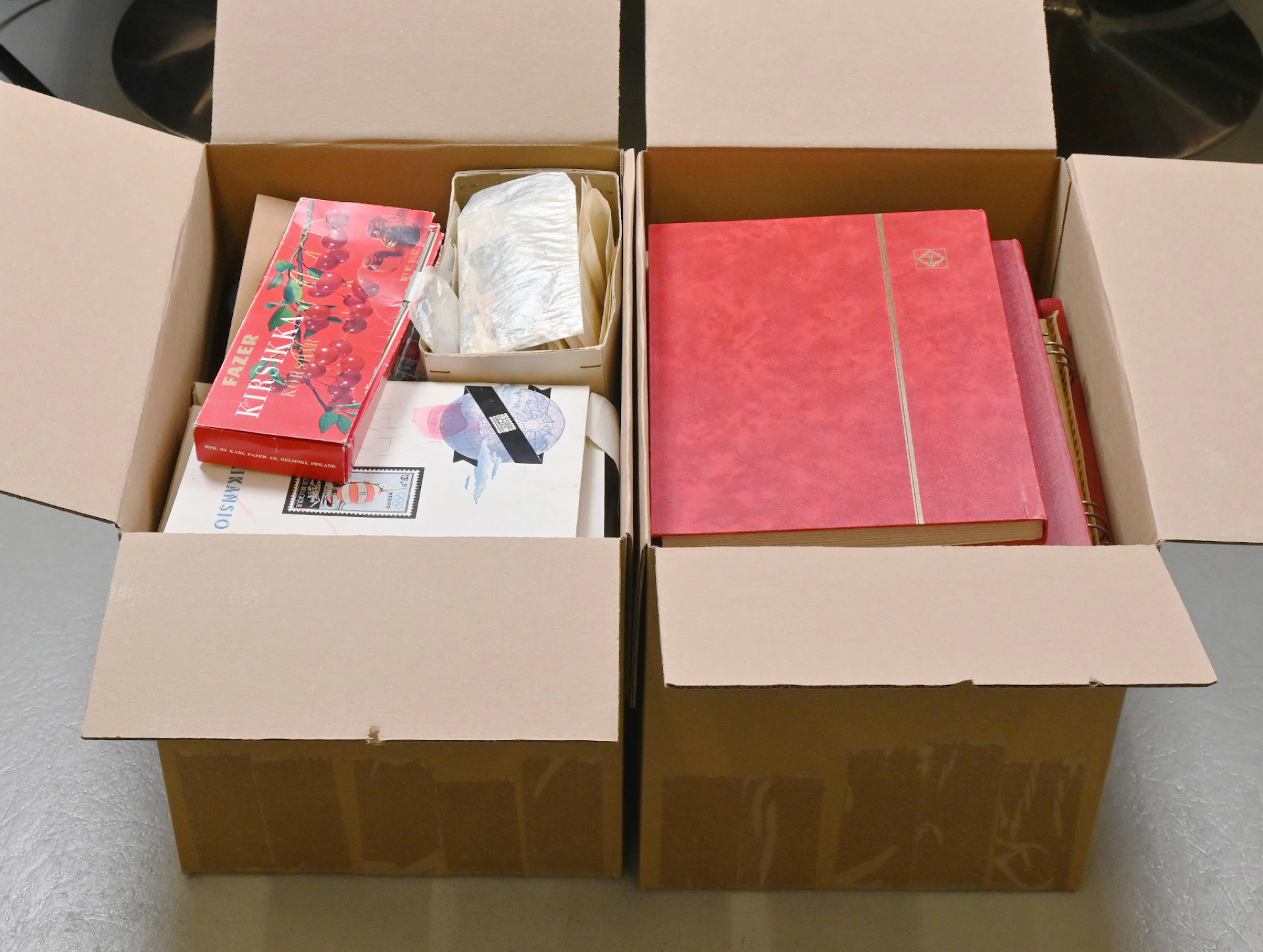 Mixed stamp lot from various countries in two boxes with gross weight