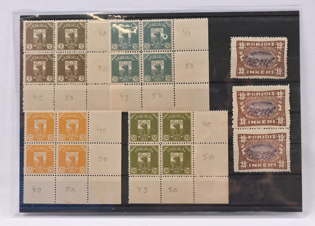 Four fine blocks of four from sheet corners: 5 penni, 10 penni, 50