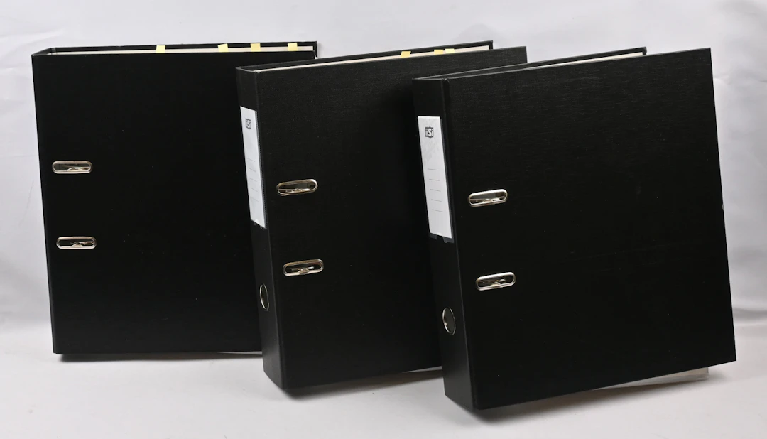 1945 - 1988 collection mounted on pages in three thick binders. On