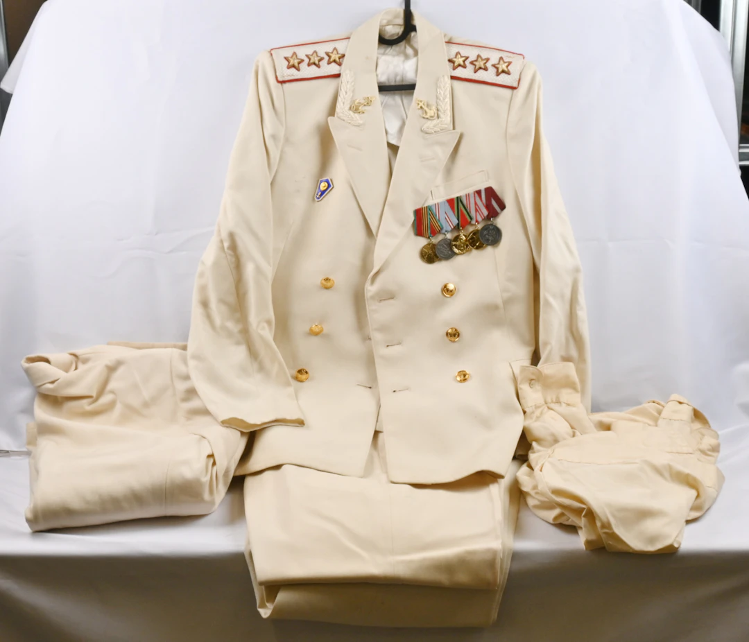 Selection of Soviet Union era military uniforms. Navy white summer