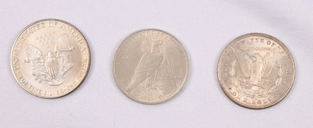 USA 1881, 1923 and 1990 1 dollar silver coins. Fine condition.