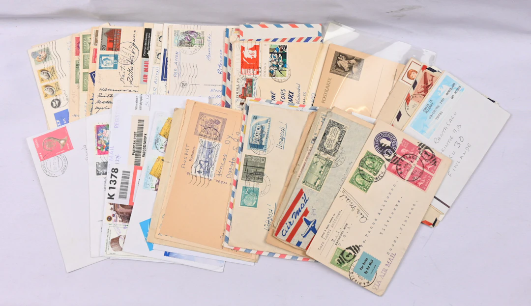 A bundle of postal items from different countries, plenty of airmail