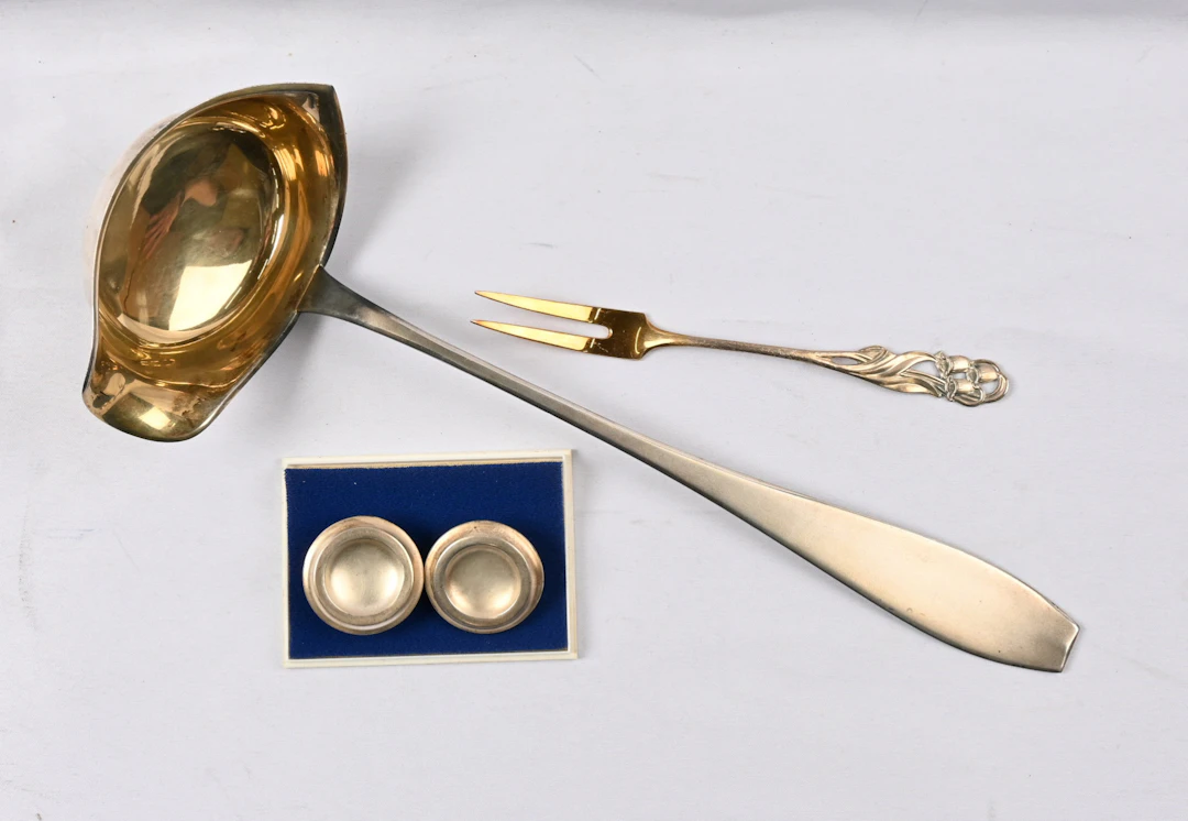 Selection of silver (813) ladle 1943 Auran Kultasepät, cheese picks