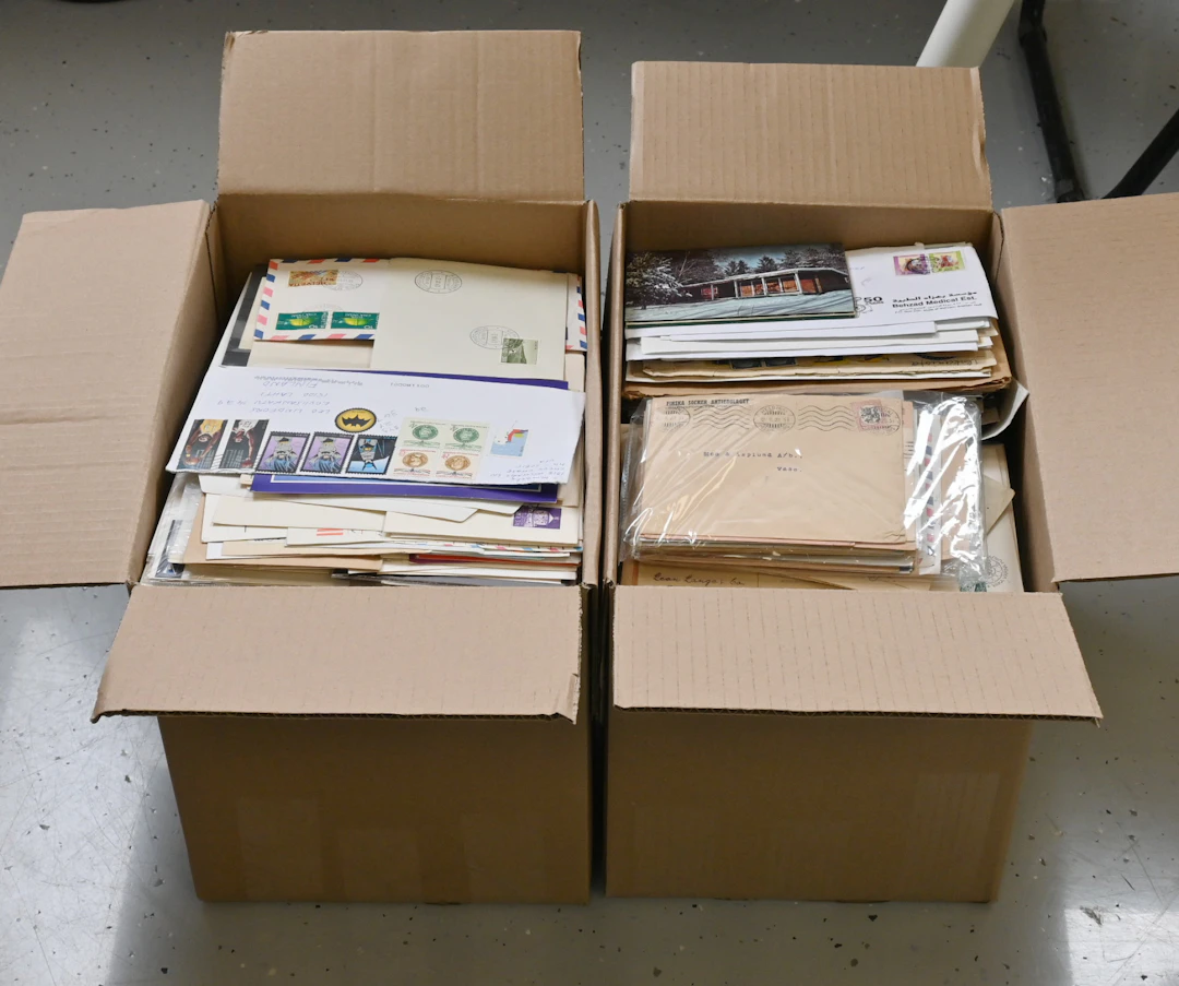 Finnish and foreign postal items mixed selection in two boxes, total