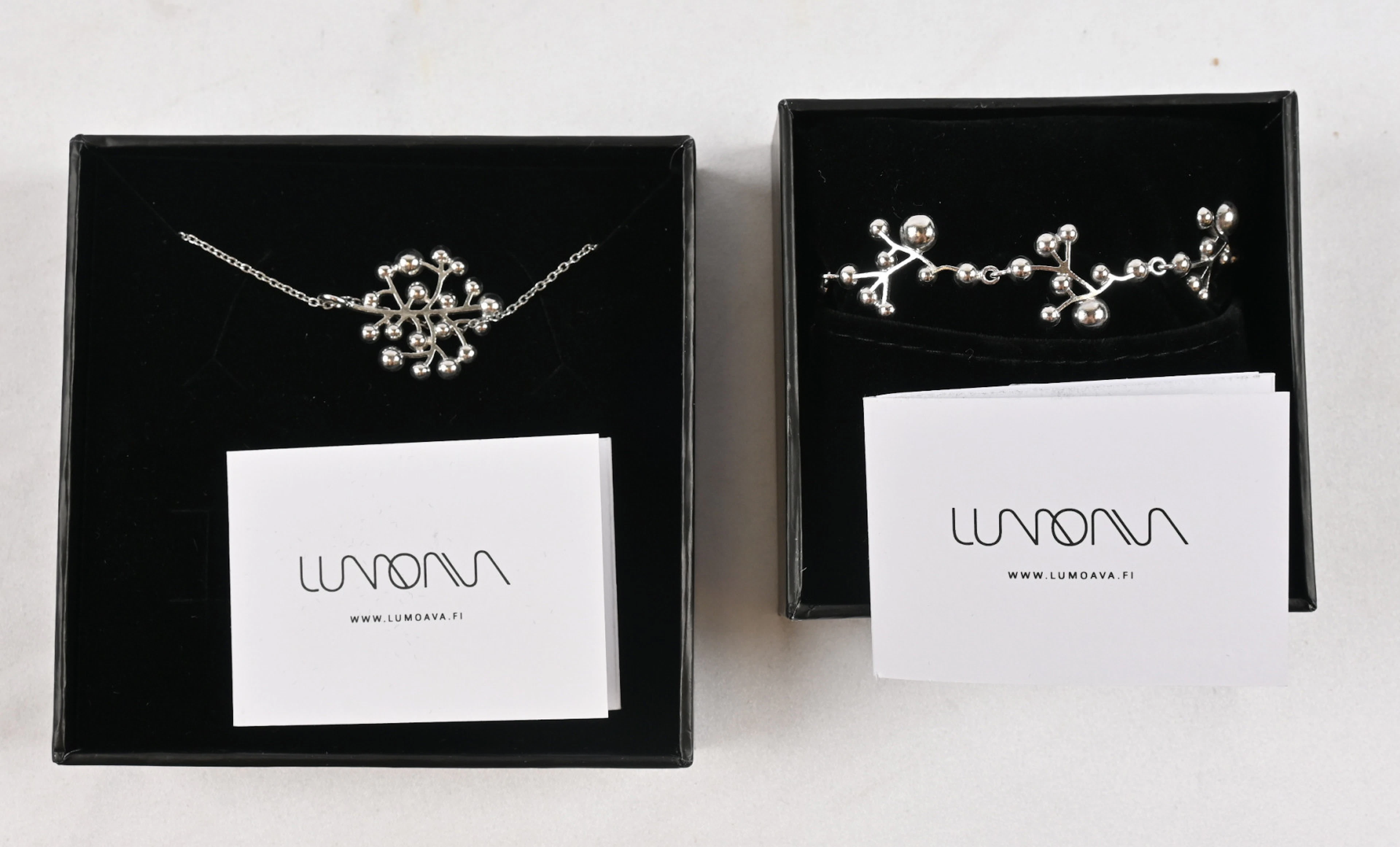 Lumoava, Carina Blomqvist two silver Stella necklaces and a bracelet