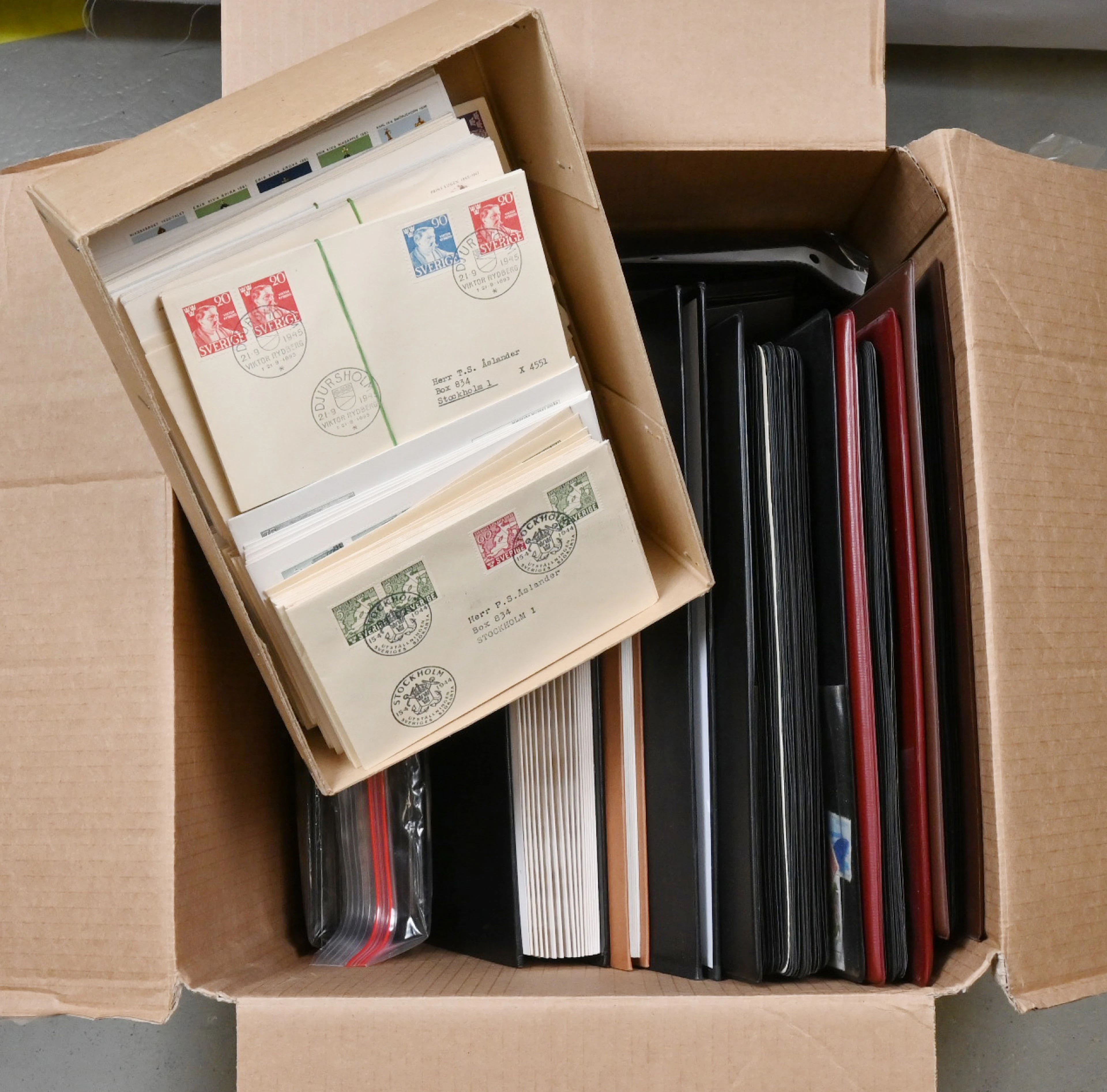 Large box 11 KG including stock albums, FDCs, old postal stationeries