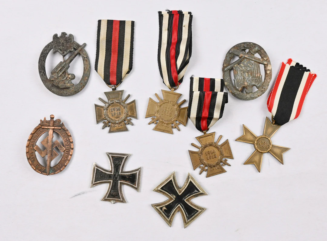Selection of German WW1 and WW2 era medals, badges. Damaged on some