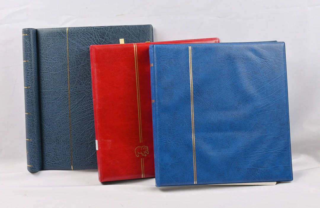 Selection of booklets from various decades in three albums, hundreds