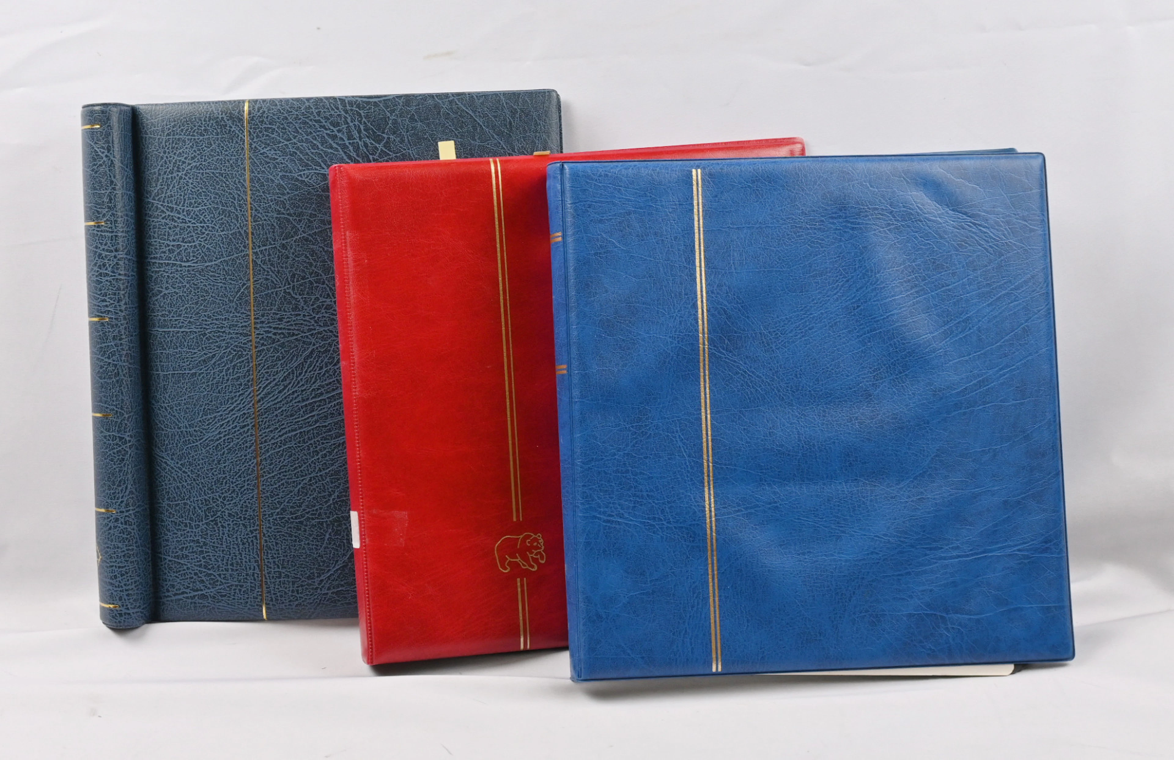 Selection of booklets from various decades in three albums, hundreds