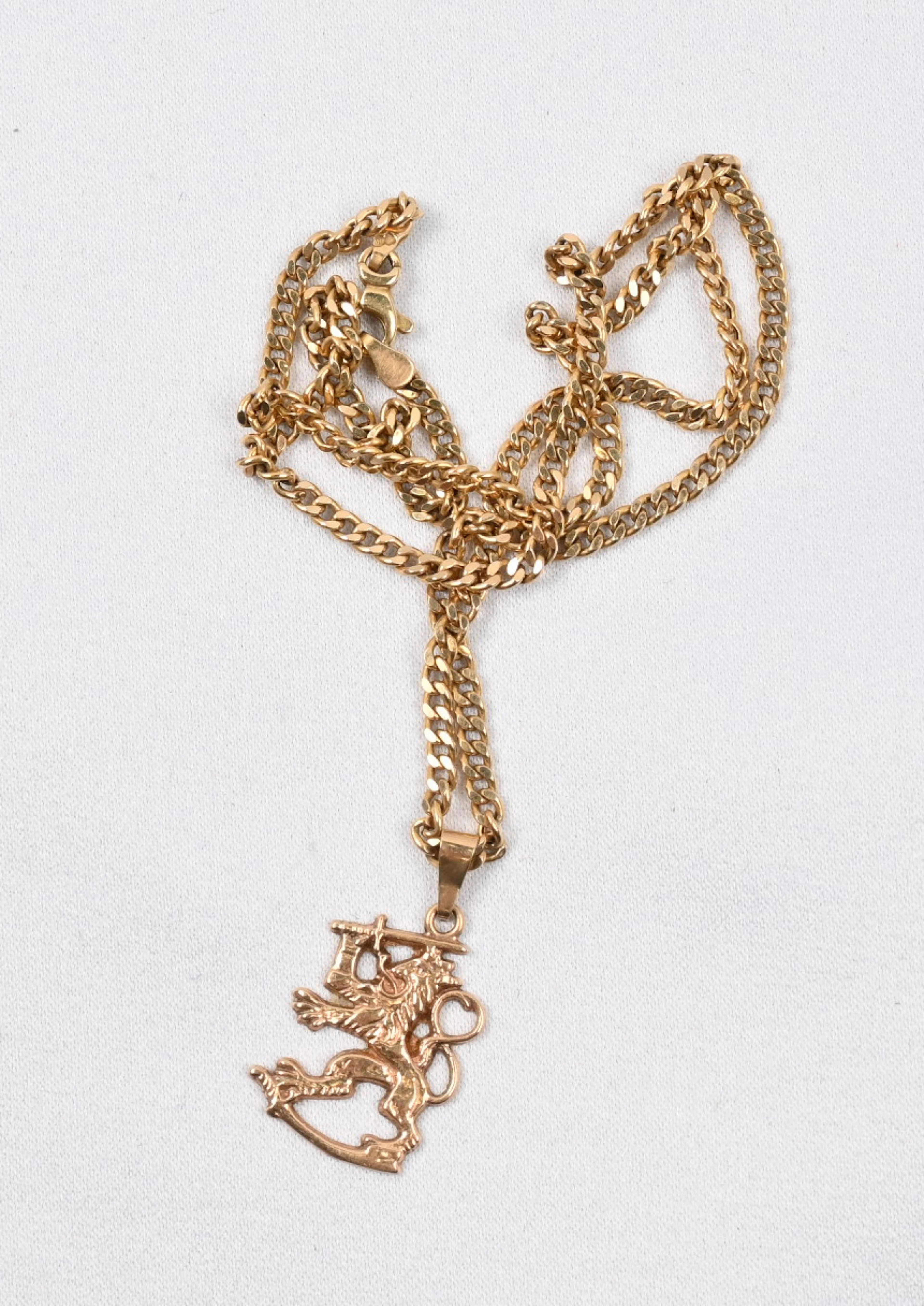 Finland lion pendant and a chain, gold (14 k). Weight approximately 7 g.