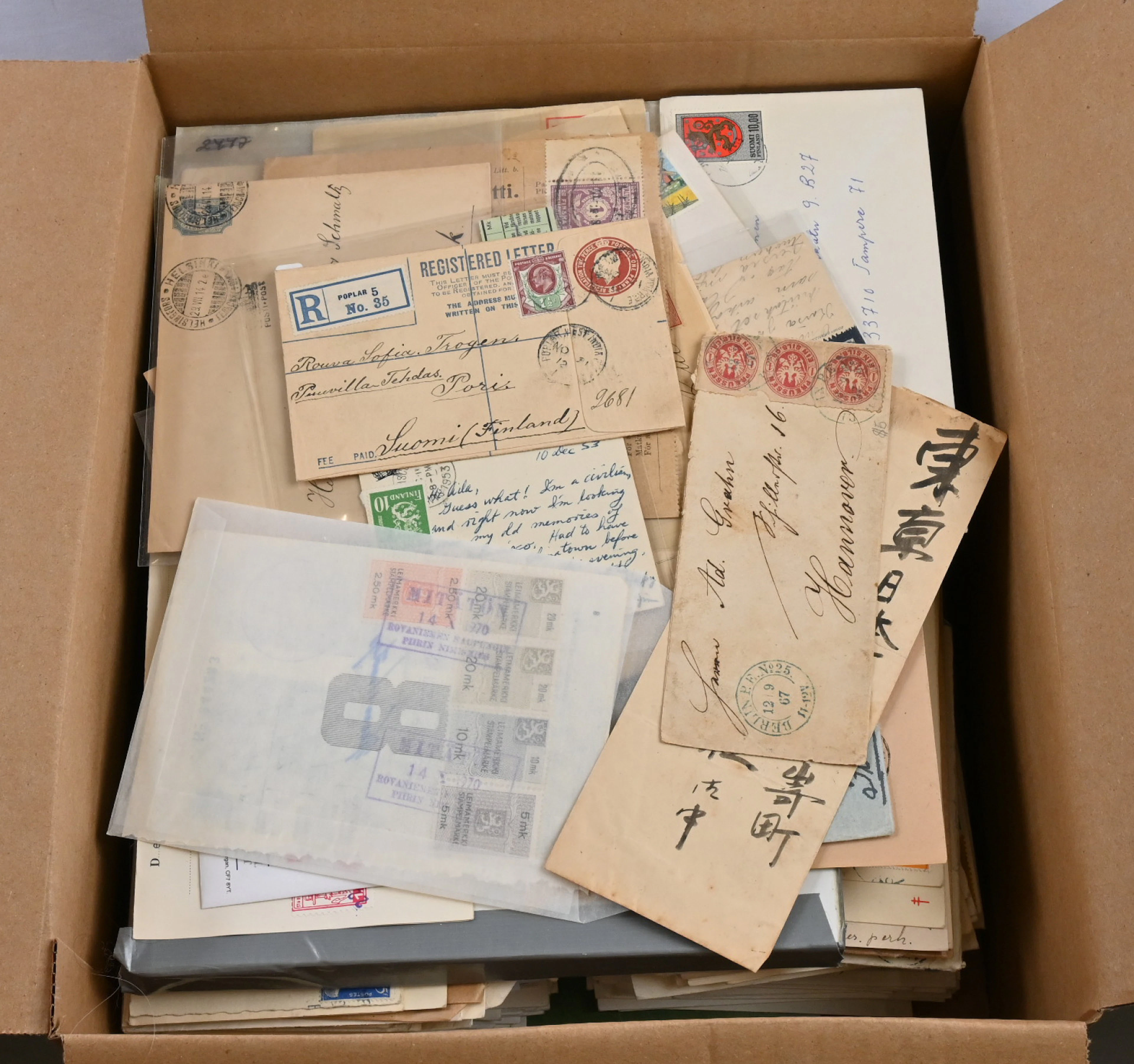 Selection of covers over 3 KG in a box Finland and foreign countries.