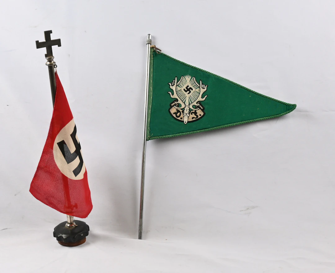 Two pennants: a swastika flag and reportedly a pennant of a German