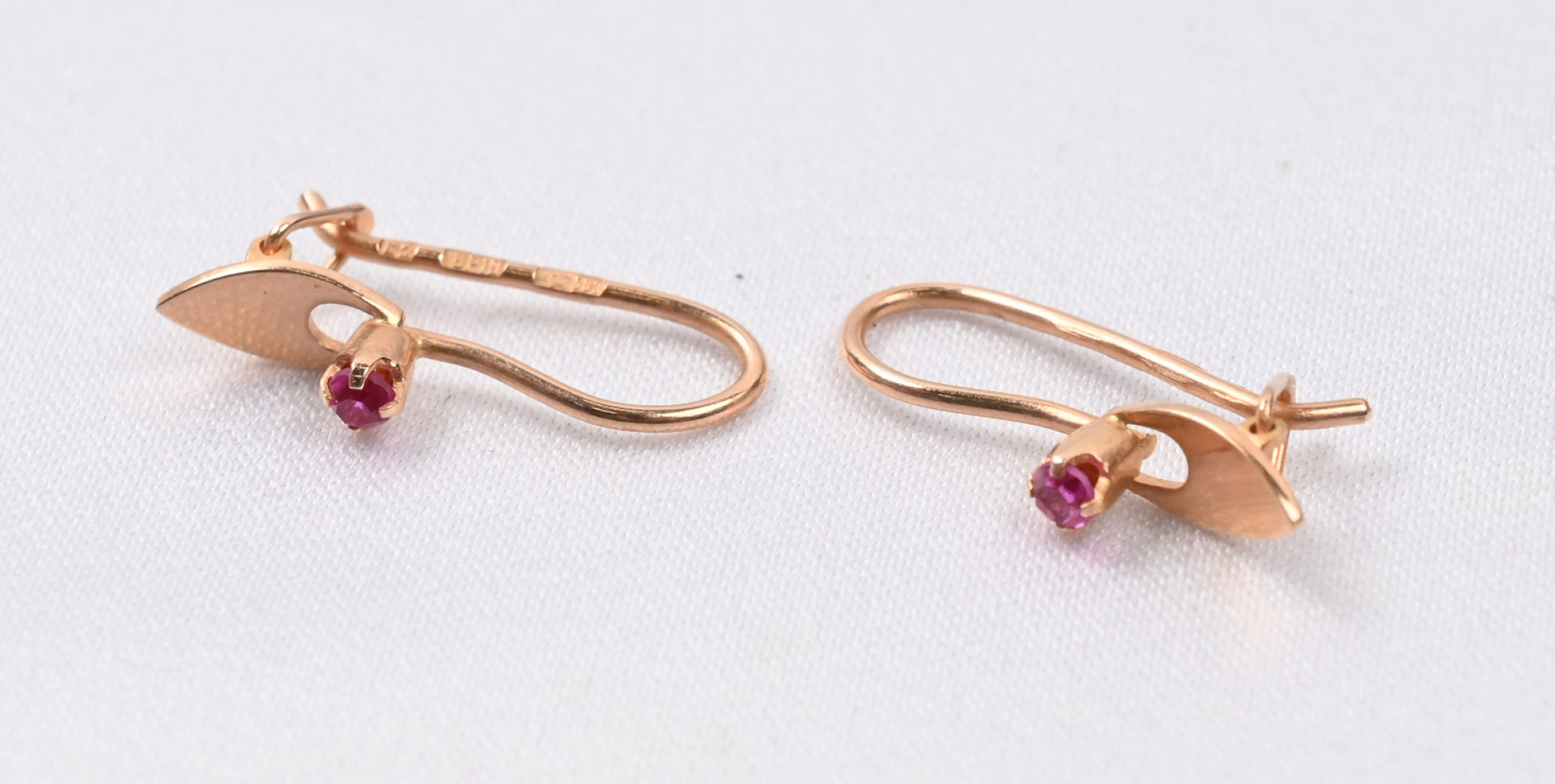 Earrings, with red gemstones, gold (585) from the Soviet Union. Gross