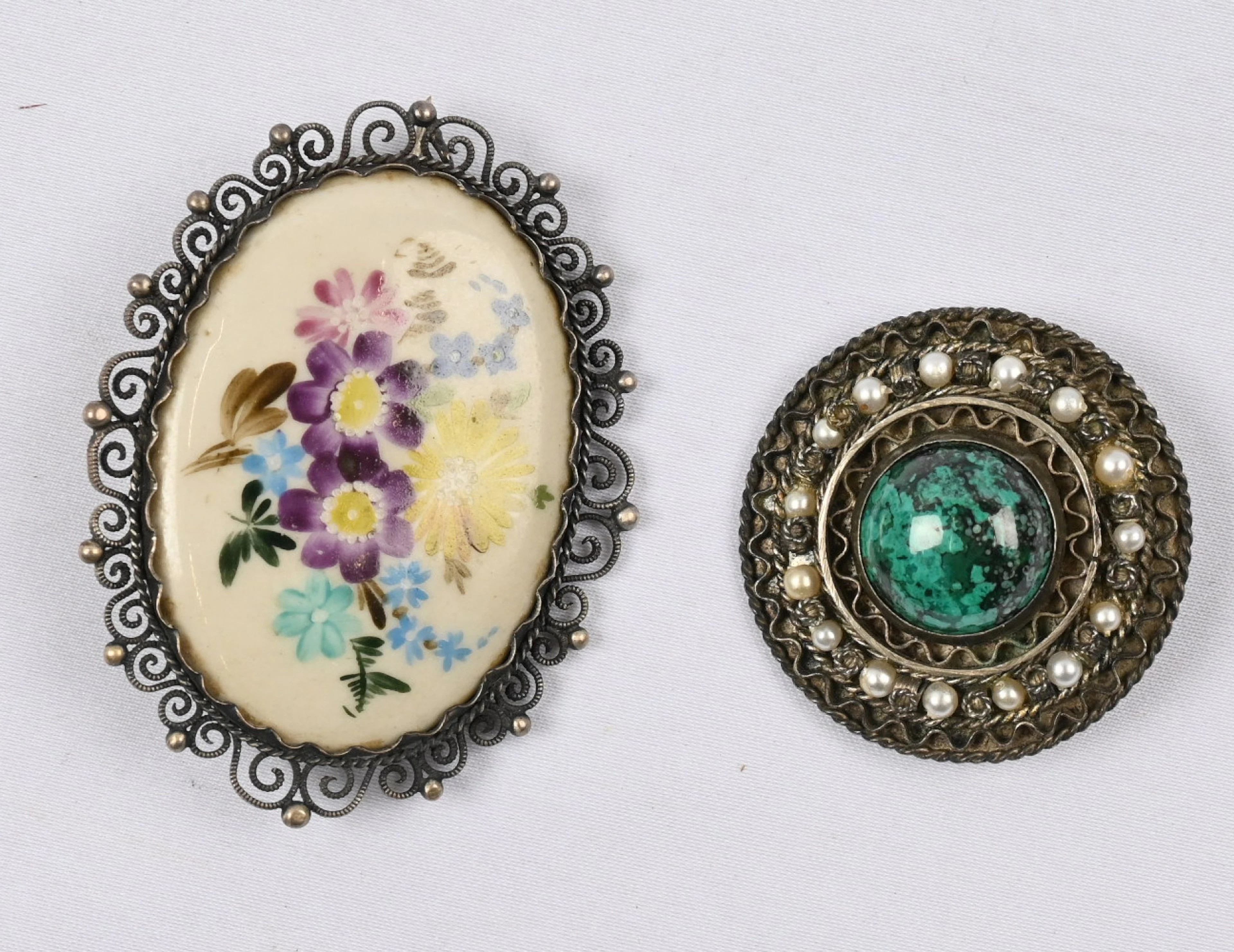 Old beautiful silver brooches two pieces. Gemstone in one of them